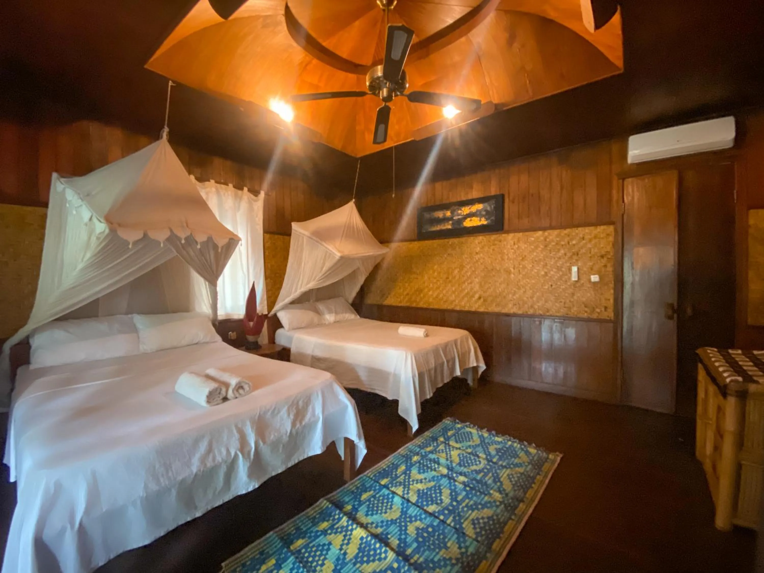 Bed in Sejuk Cottages