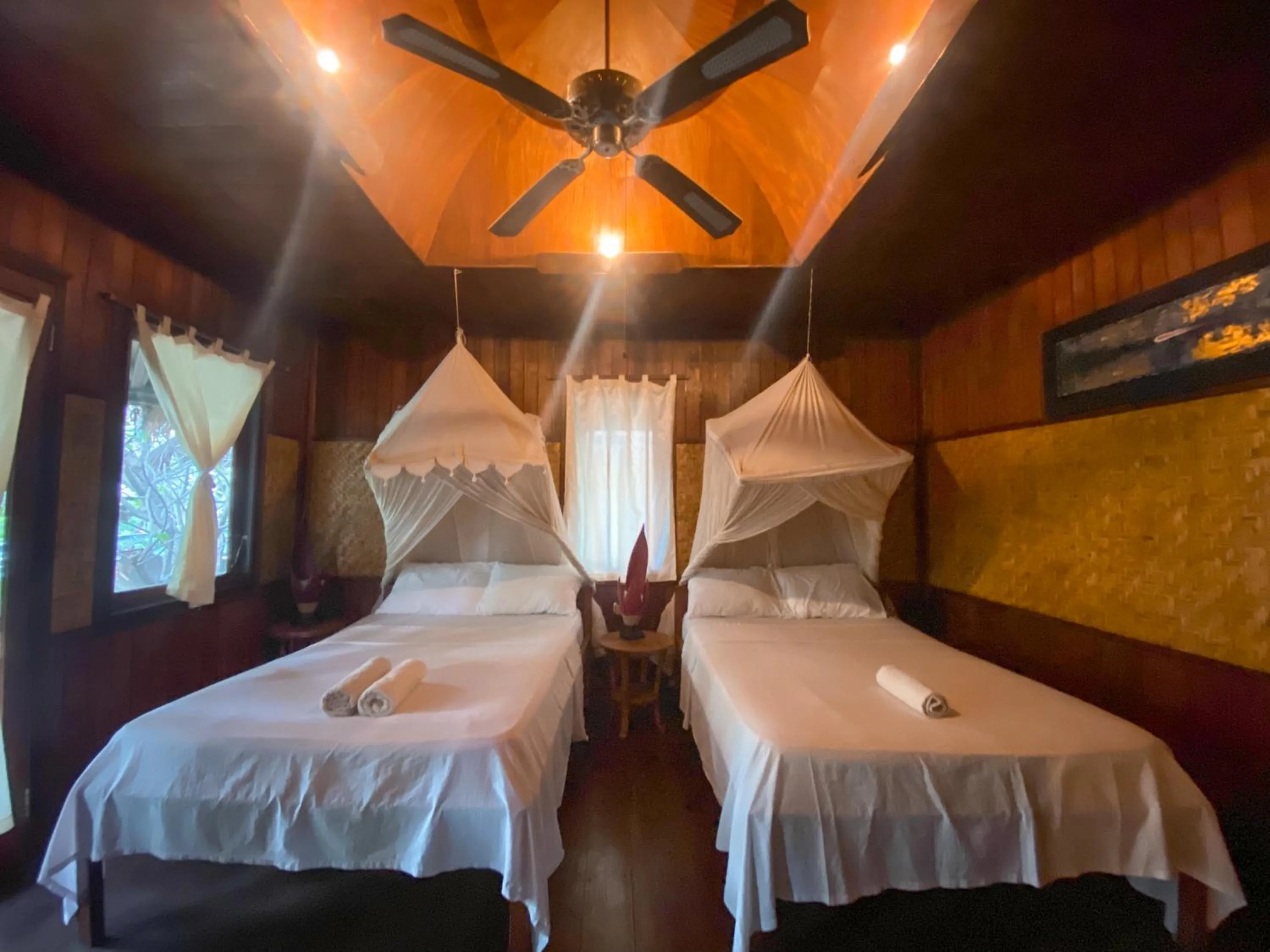 Bed in Sejuk Cottages