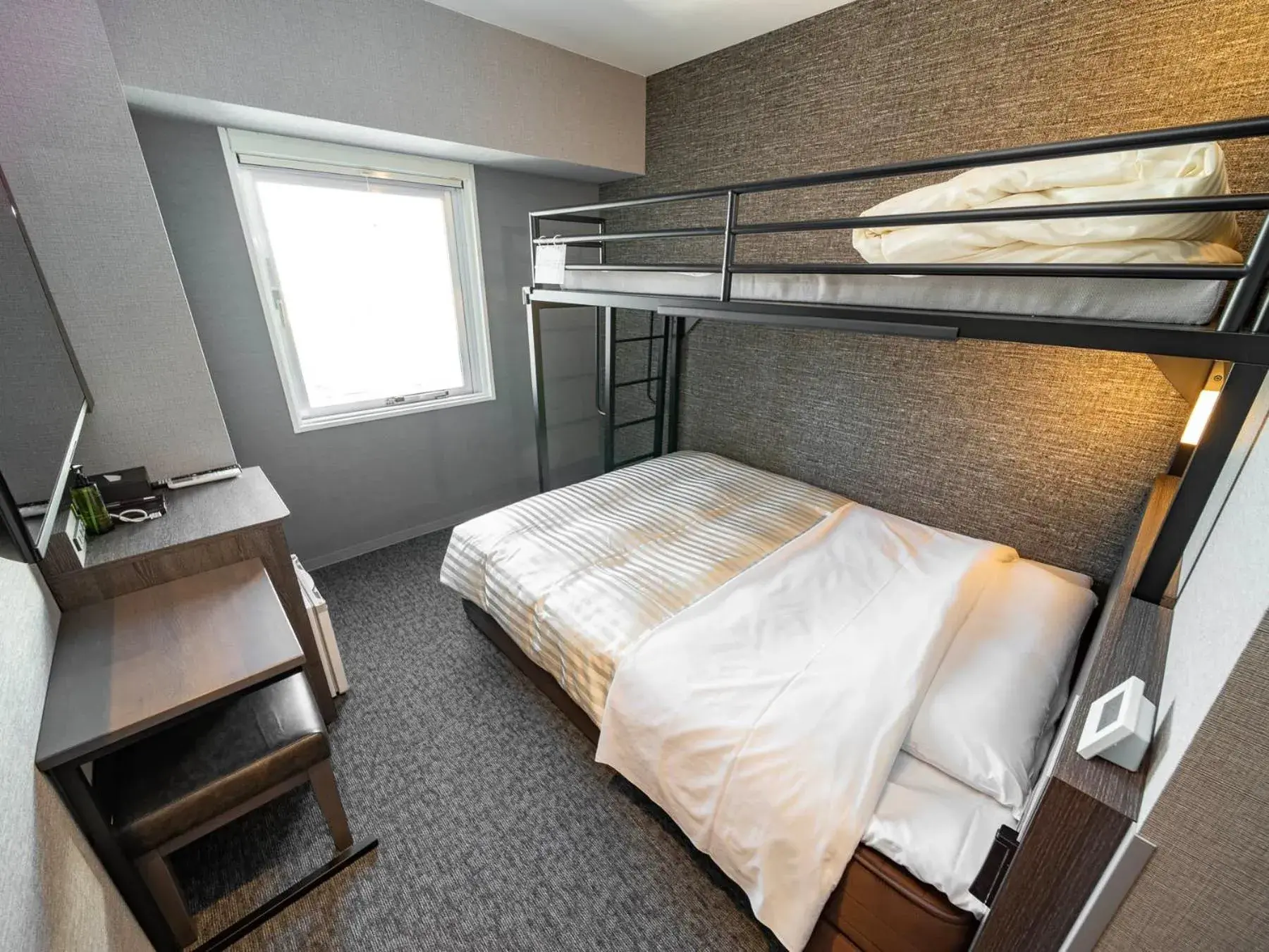 Bed in SUPER HOTEL Ikebukuro West Natural Hot Spring Bed in SUPER HOTEL Ikebukuro West Natural Hot Spring