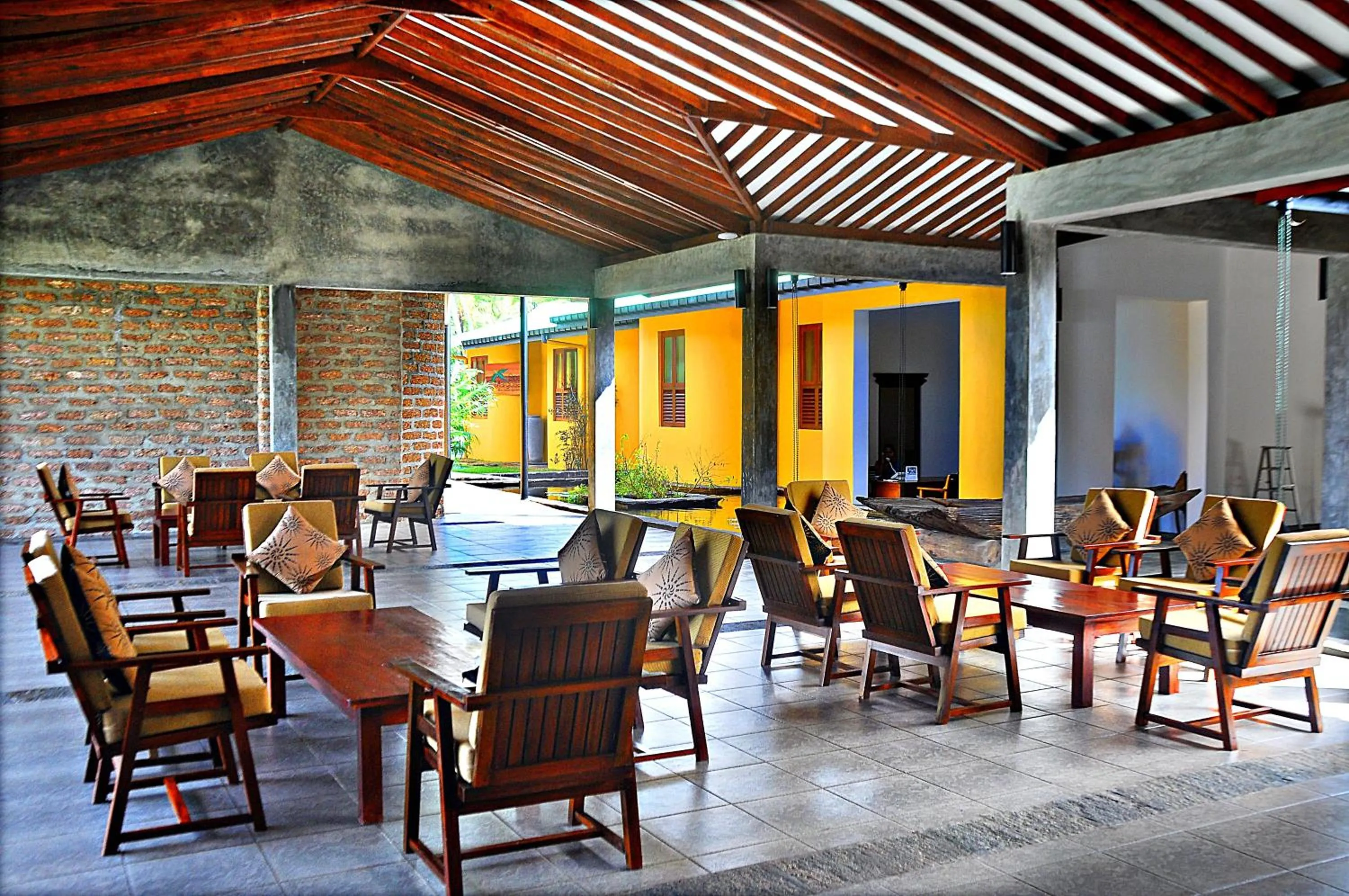 Communal lounge/ TV room in The Beach Cabanas Retreat & Spa