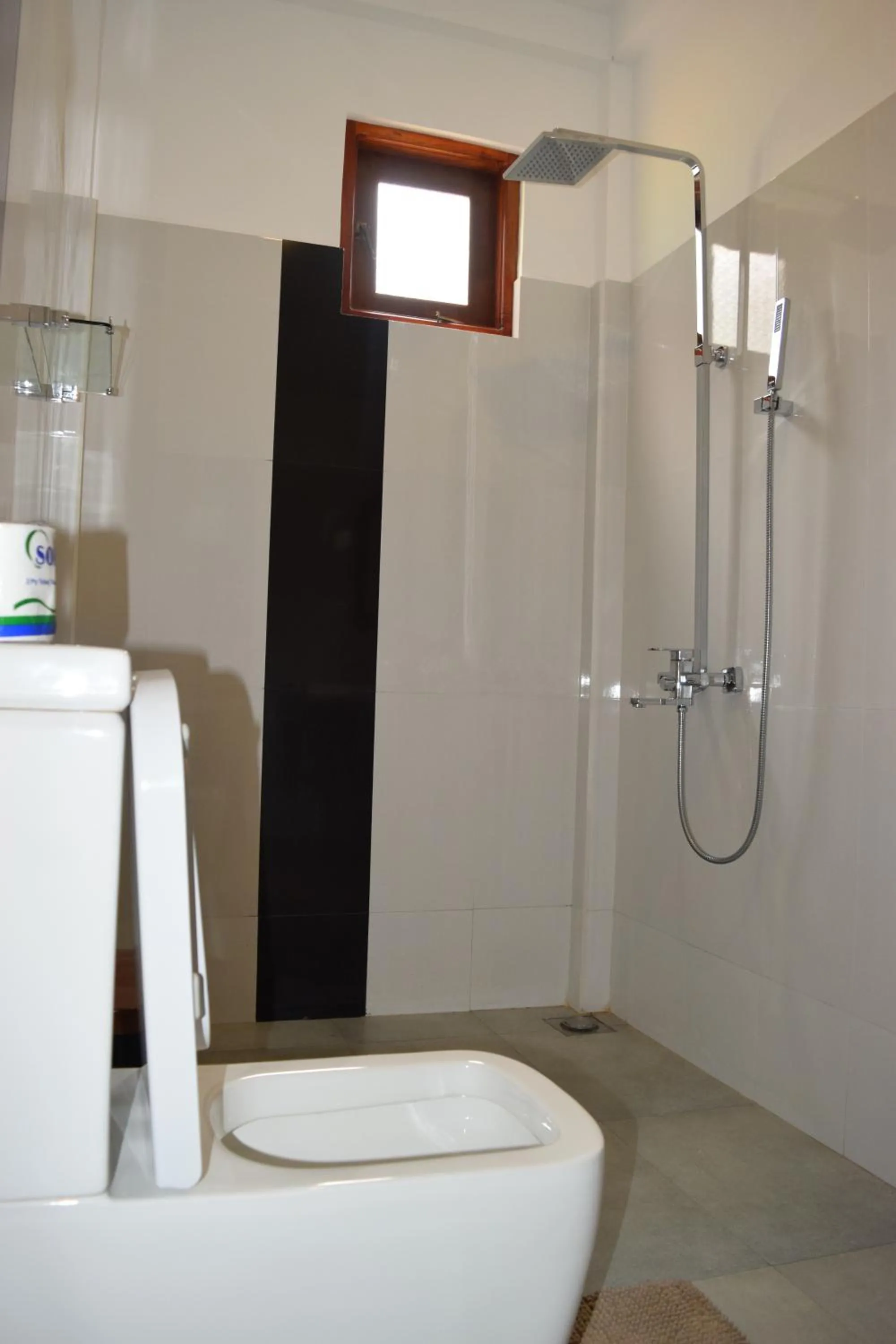 Bathroom in The Coconut Gardens Hotel & Restaurant
