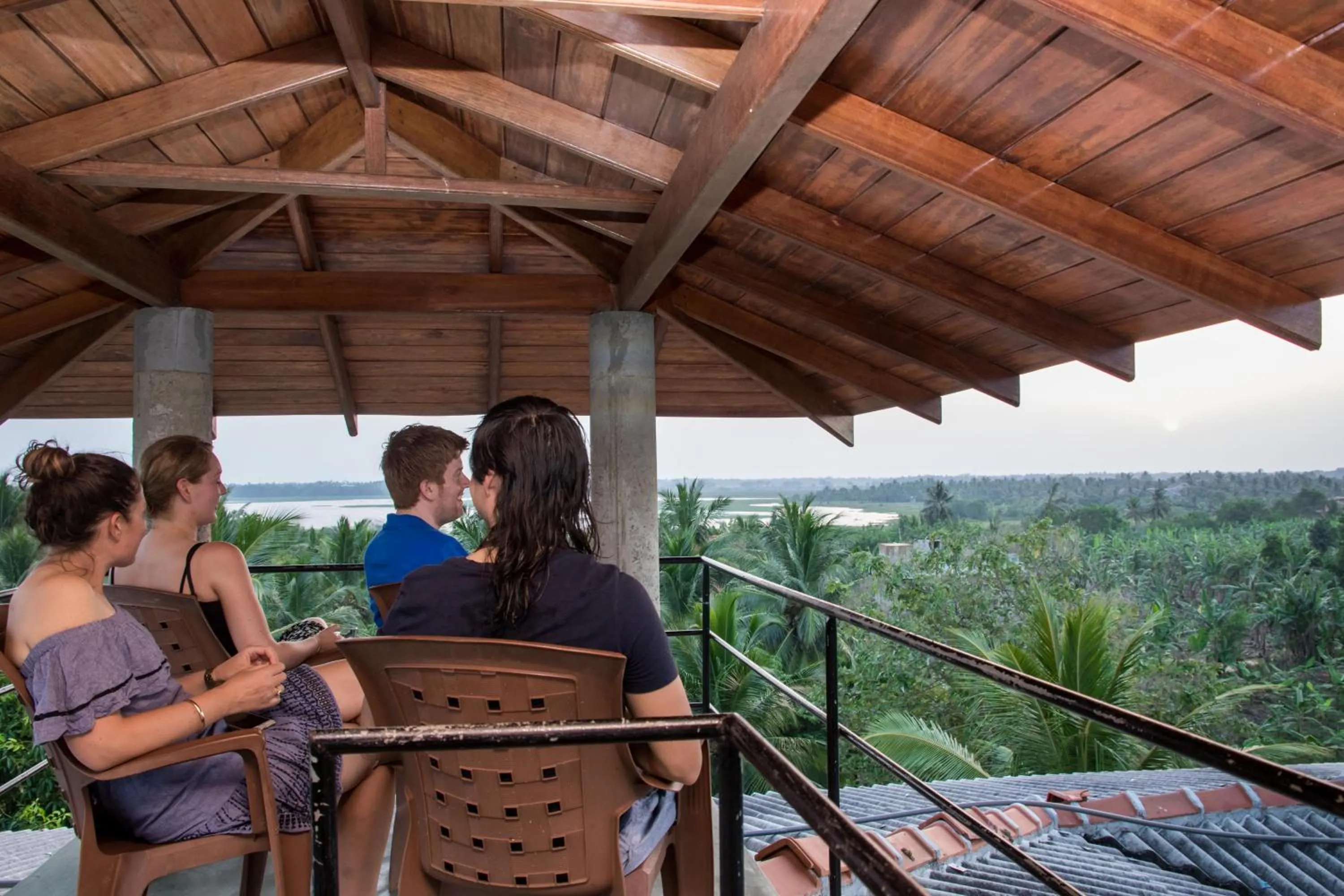 group of guests in The Coconut Gardens Hotel & Restaurant