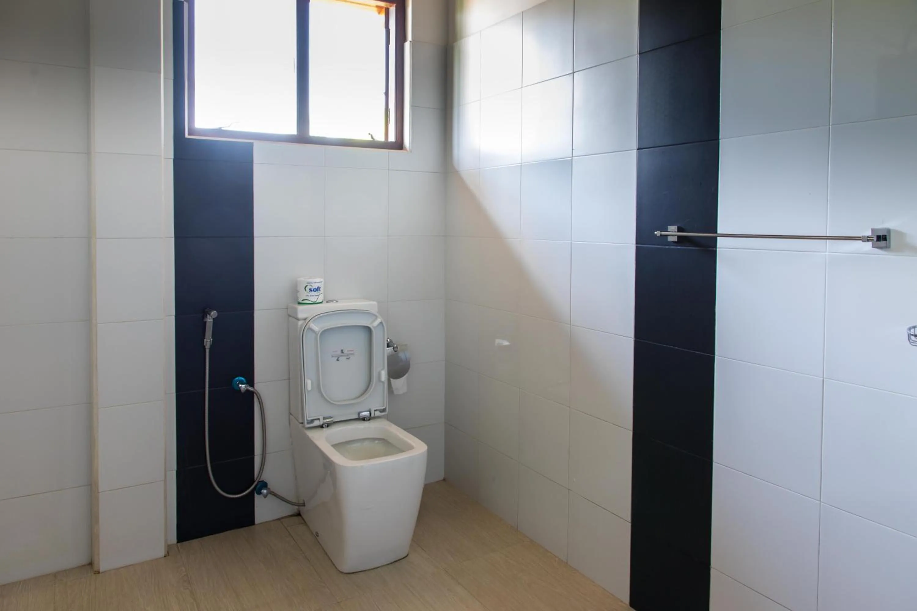 Bathroom in The Coconut Gardens Hotel & Restaurant