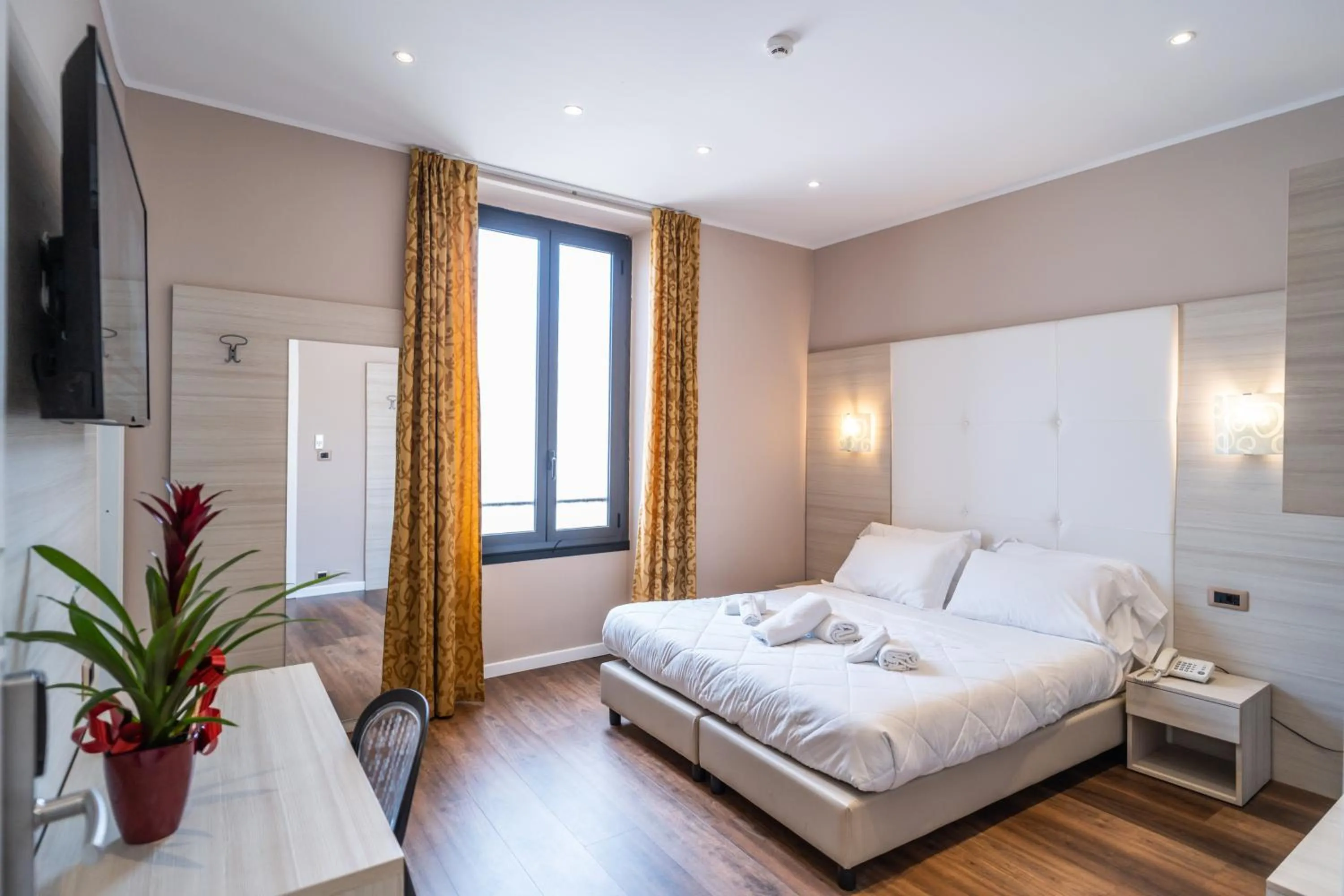 Bed in Hotel Globo Suite-Correnti hotels