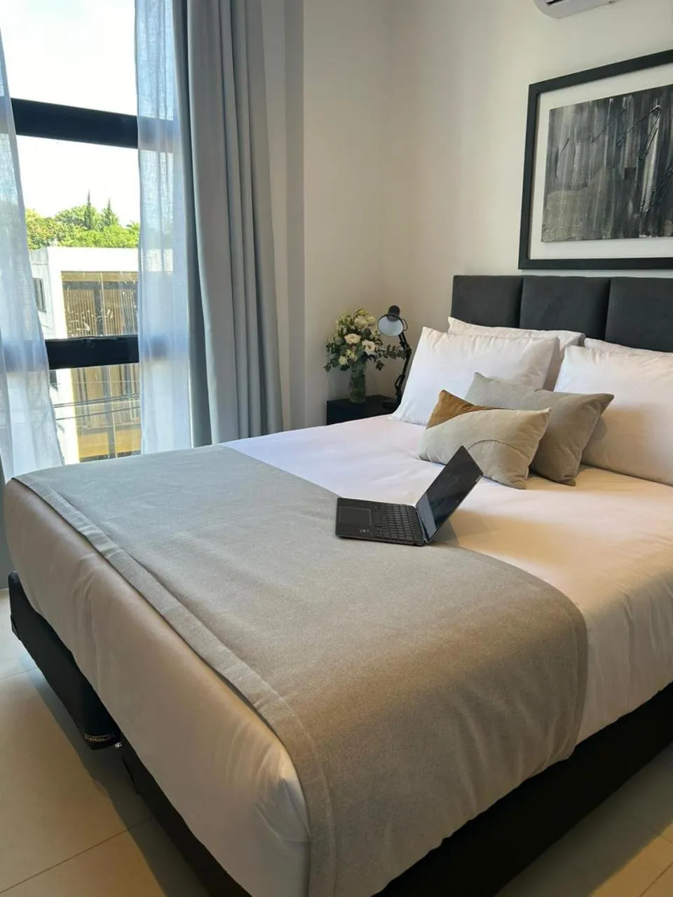 Bed in Divina Tower Apart Hotel