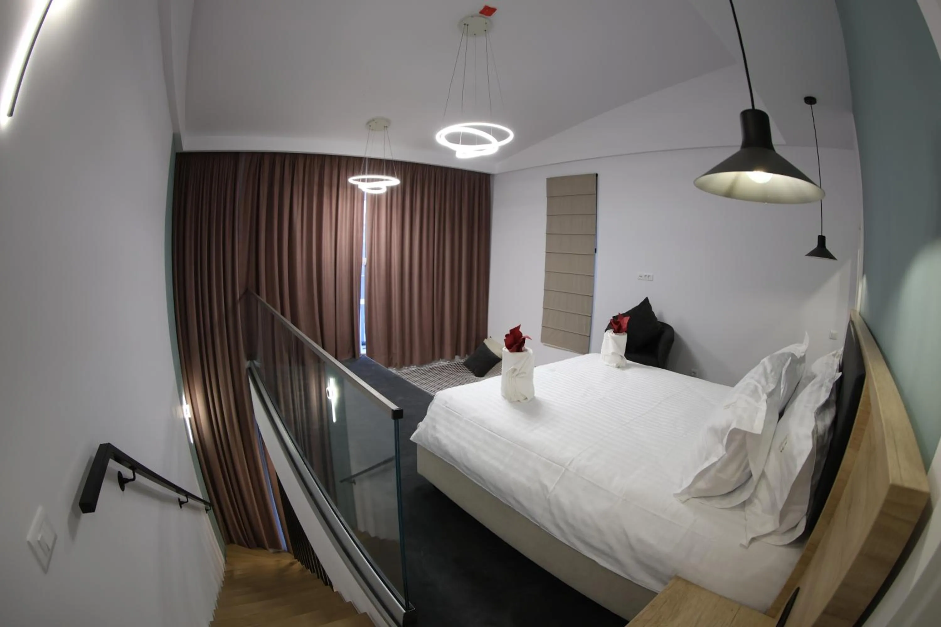 Seating area, Bed in Montan-Aparthotel