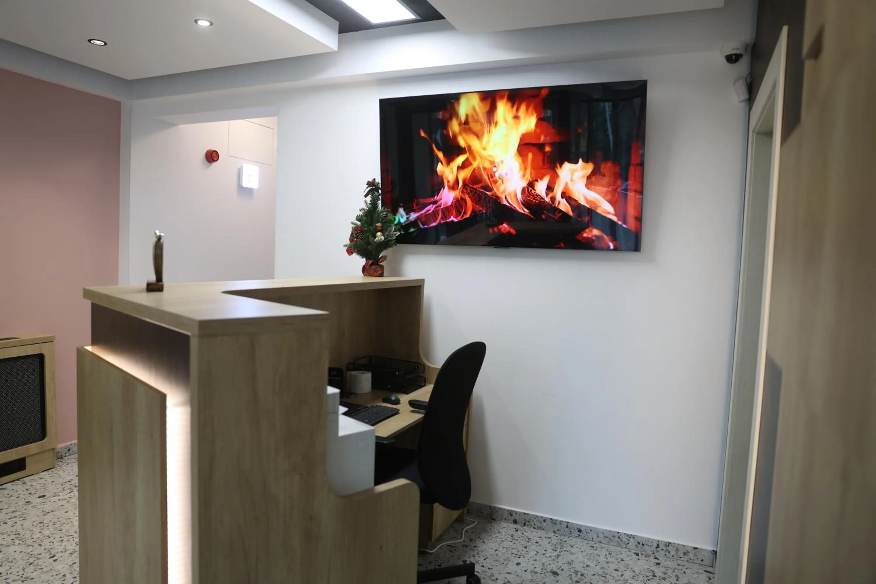 Communal lounge/ TV room in Montan-Aparthotel