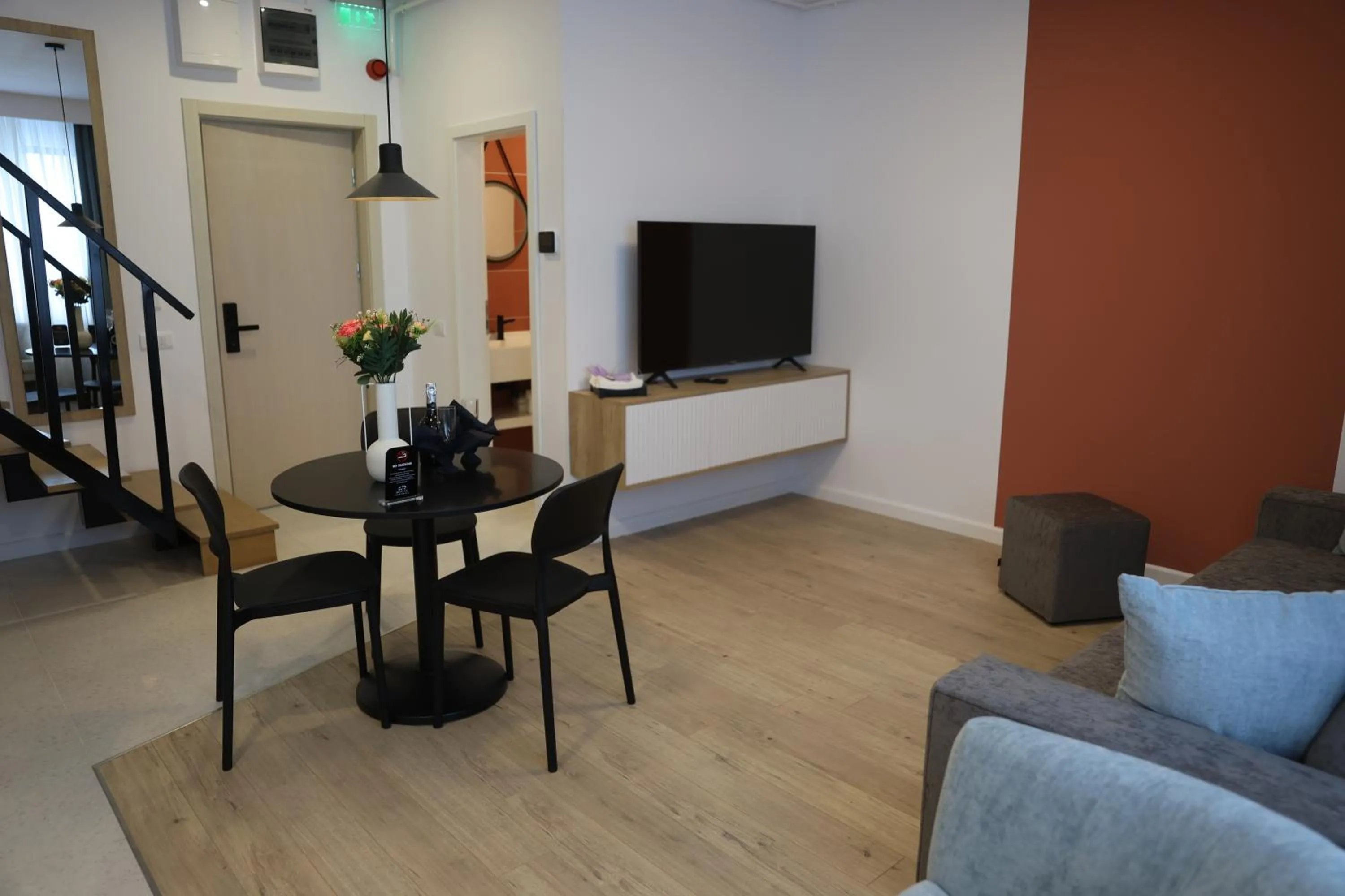 Communal lounge/ TV room in Montan-Aparthotel