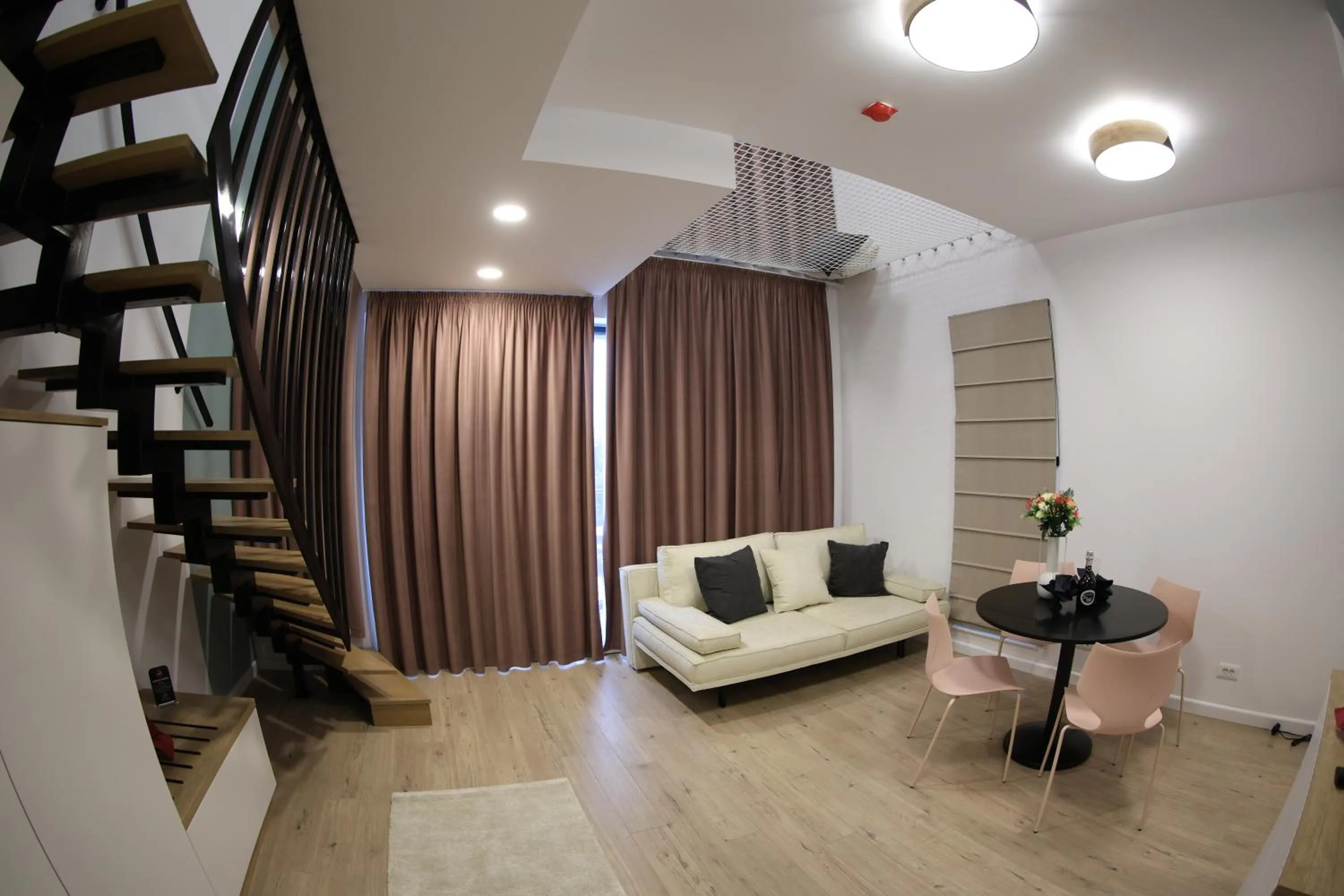 Living room, Bed in Montan-Aparthotel