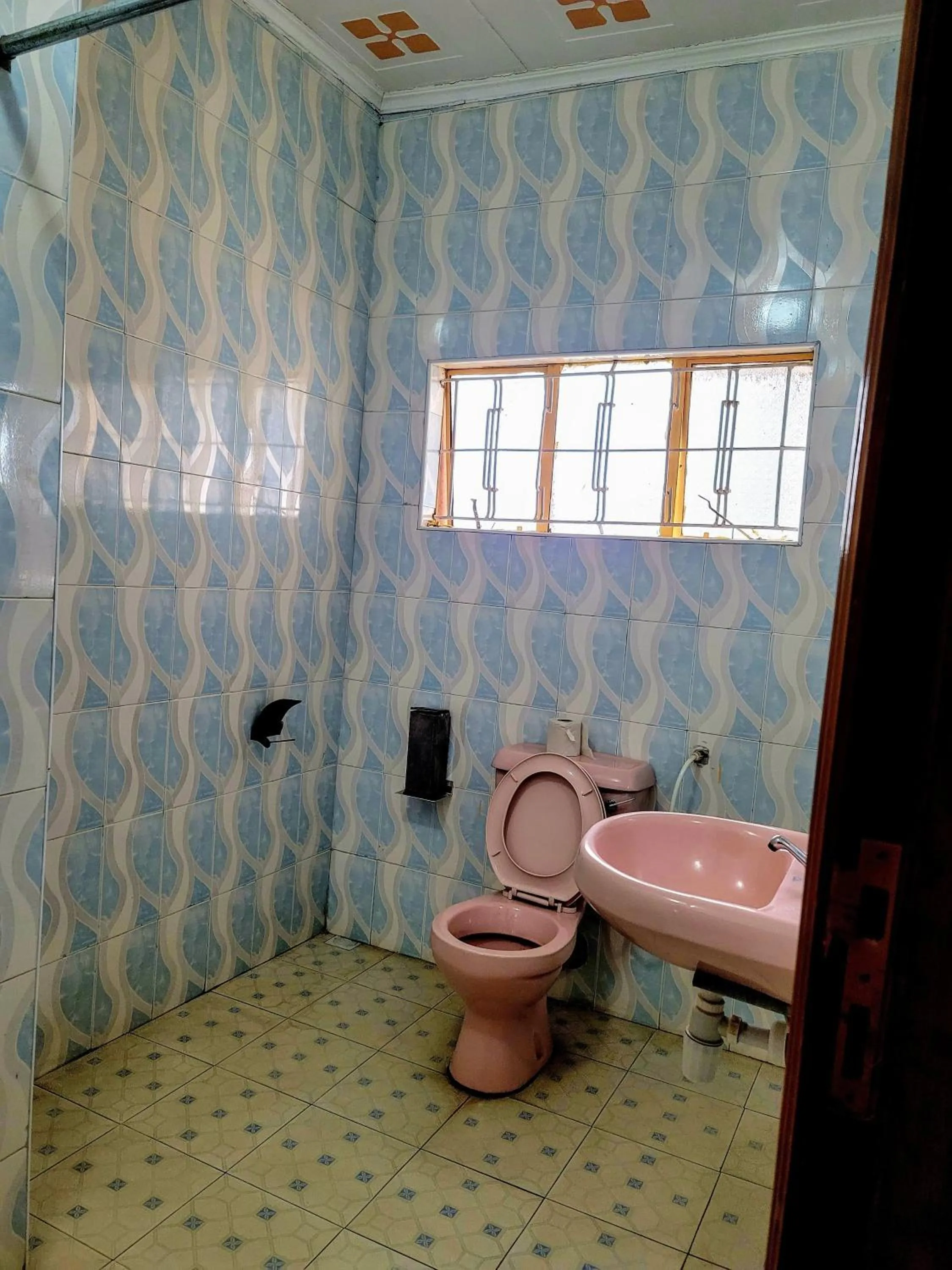 Toilet in Apex Resort