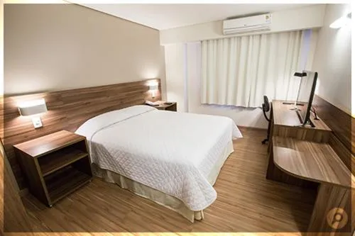Bed in Mogano Business Hotel- ELETROPOSTO