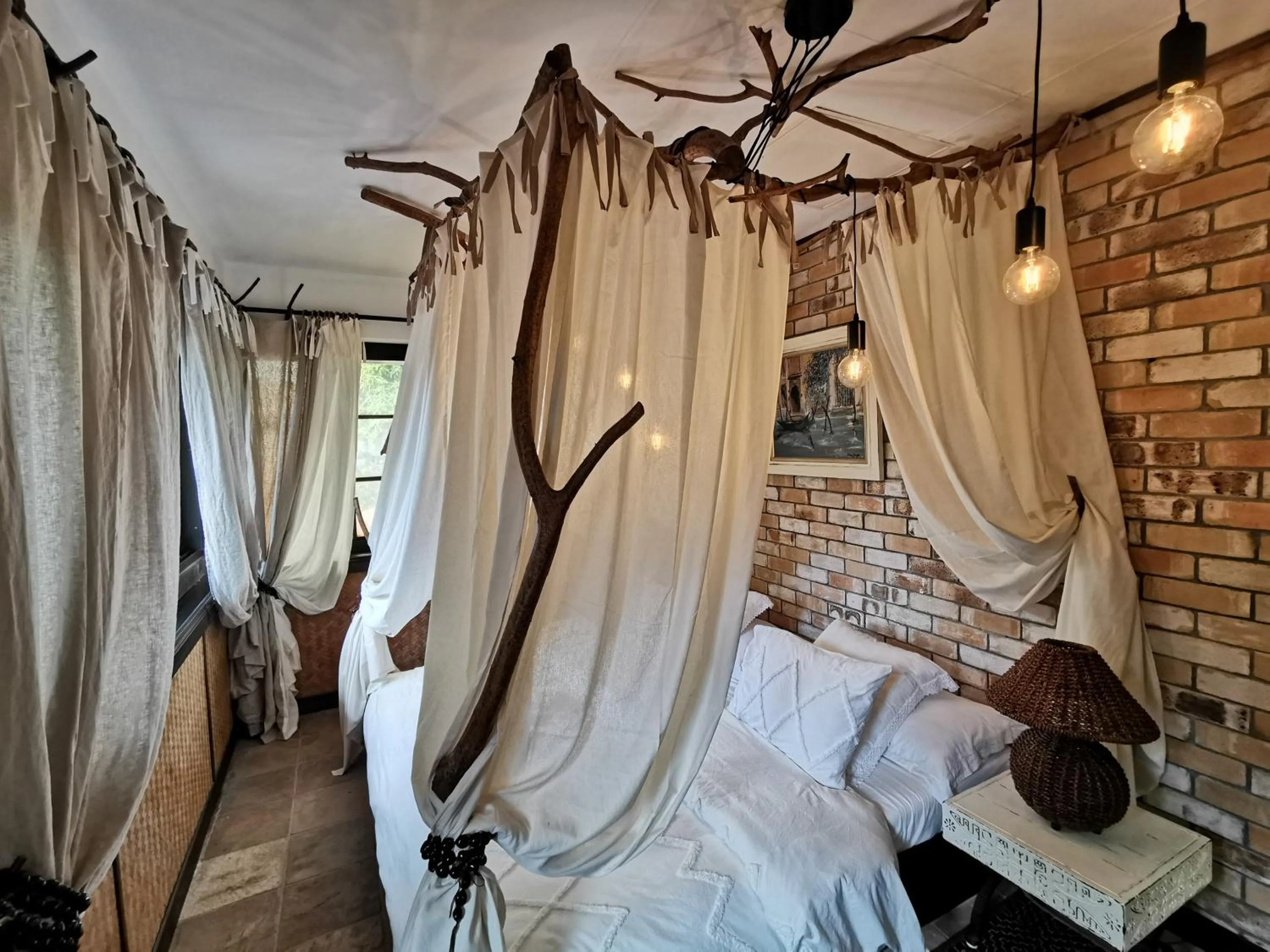 Bed in Hôtel Fenua Mata'i'oa