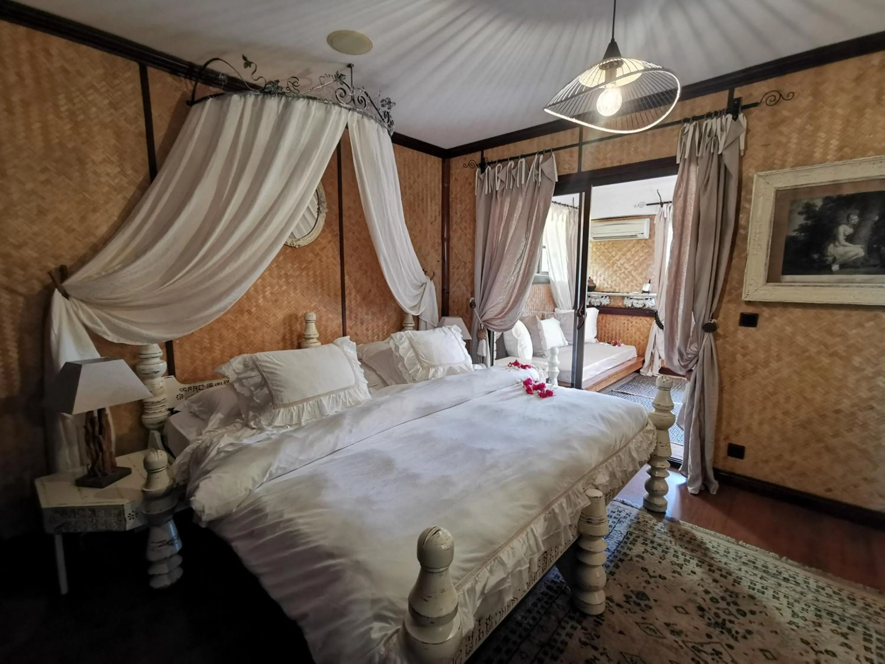 Bed in Hôtel Fenua Mata'i'oa