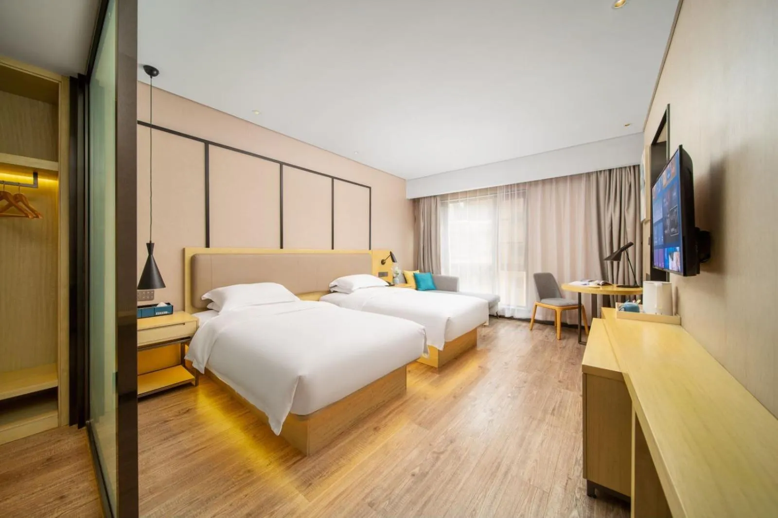 Photo of the whole room, Bed in Echarm Hotel Kunming Changshui International Airport