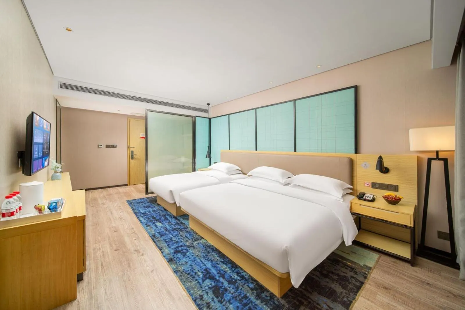 Photo of the whole room, Bed in Echarm Hotel Kunming Changshui International Airport