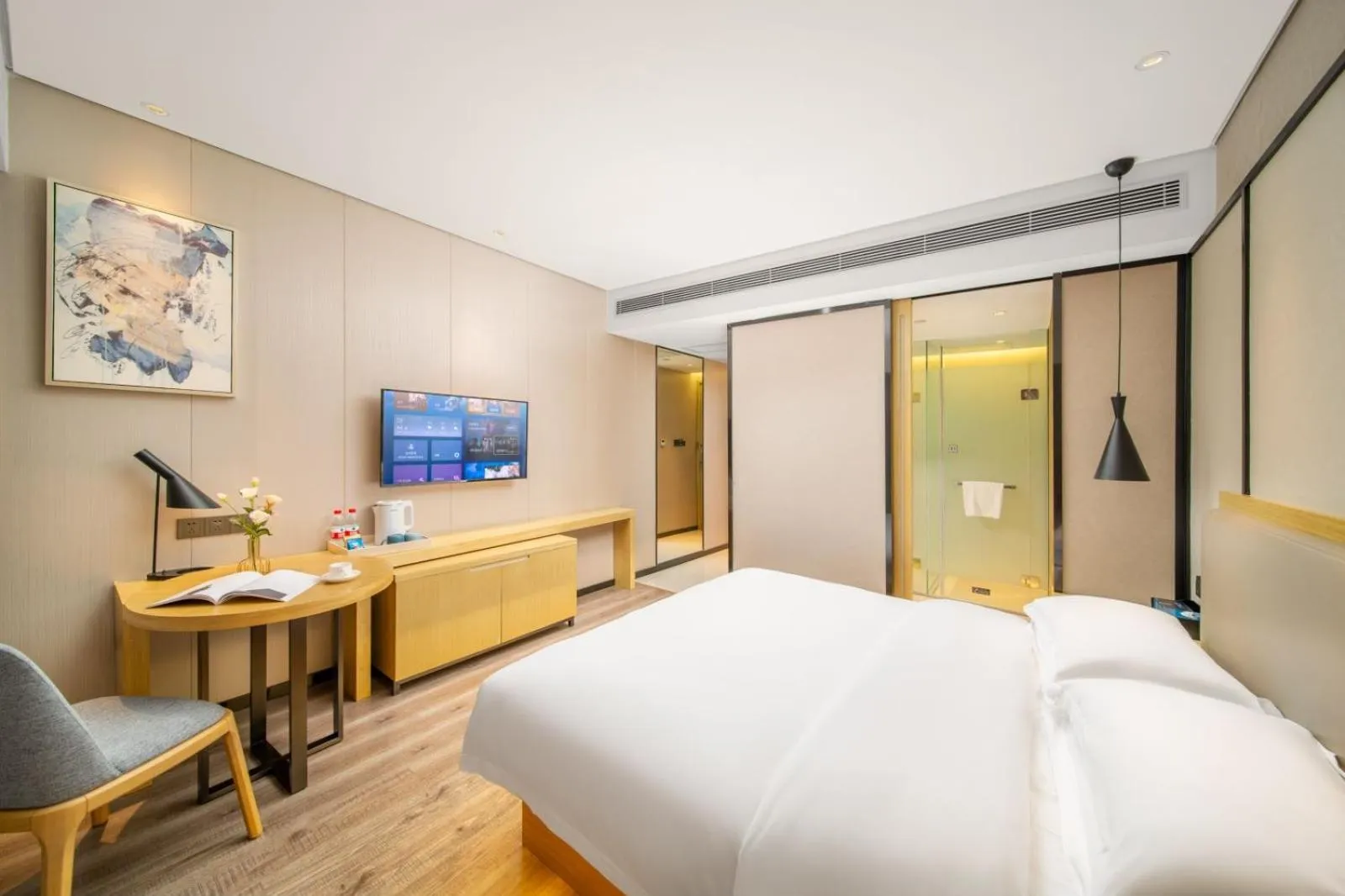 Bed in Echarm Hotel Kunming Changshui International Airport