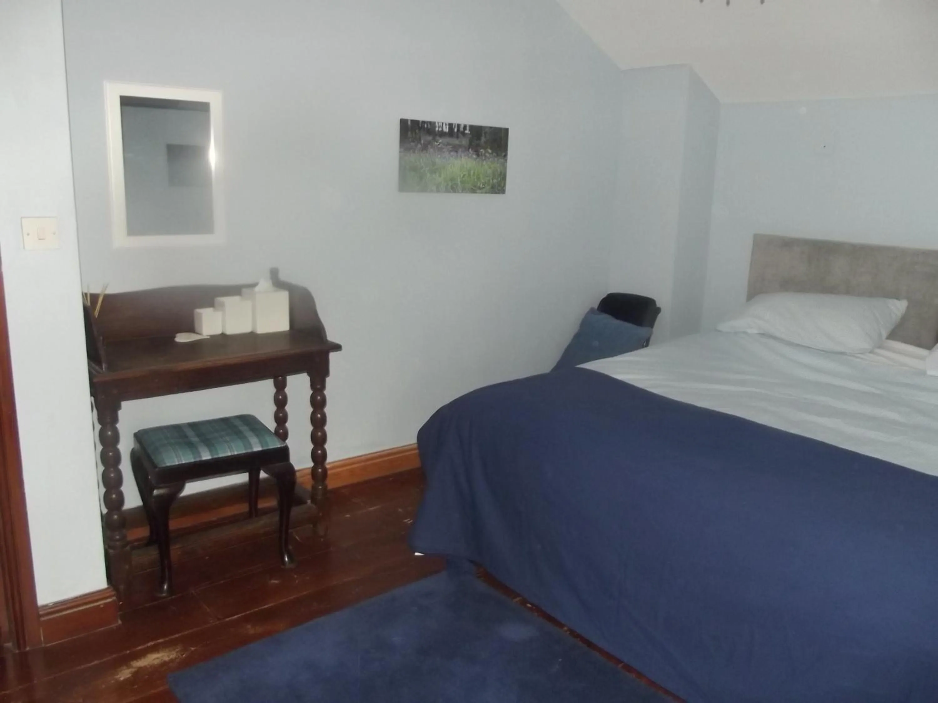 Bed in Pleck Barn B&B