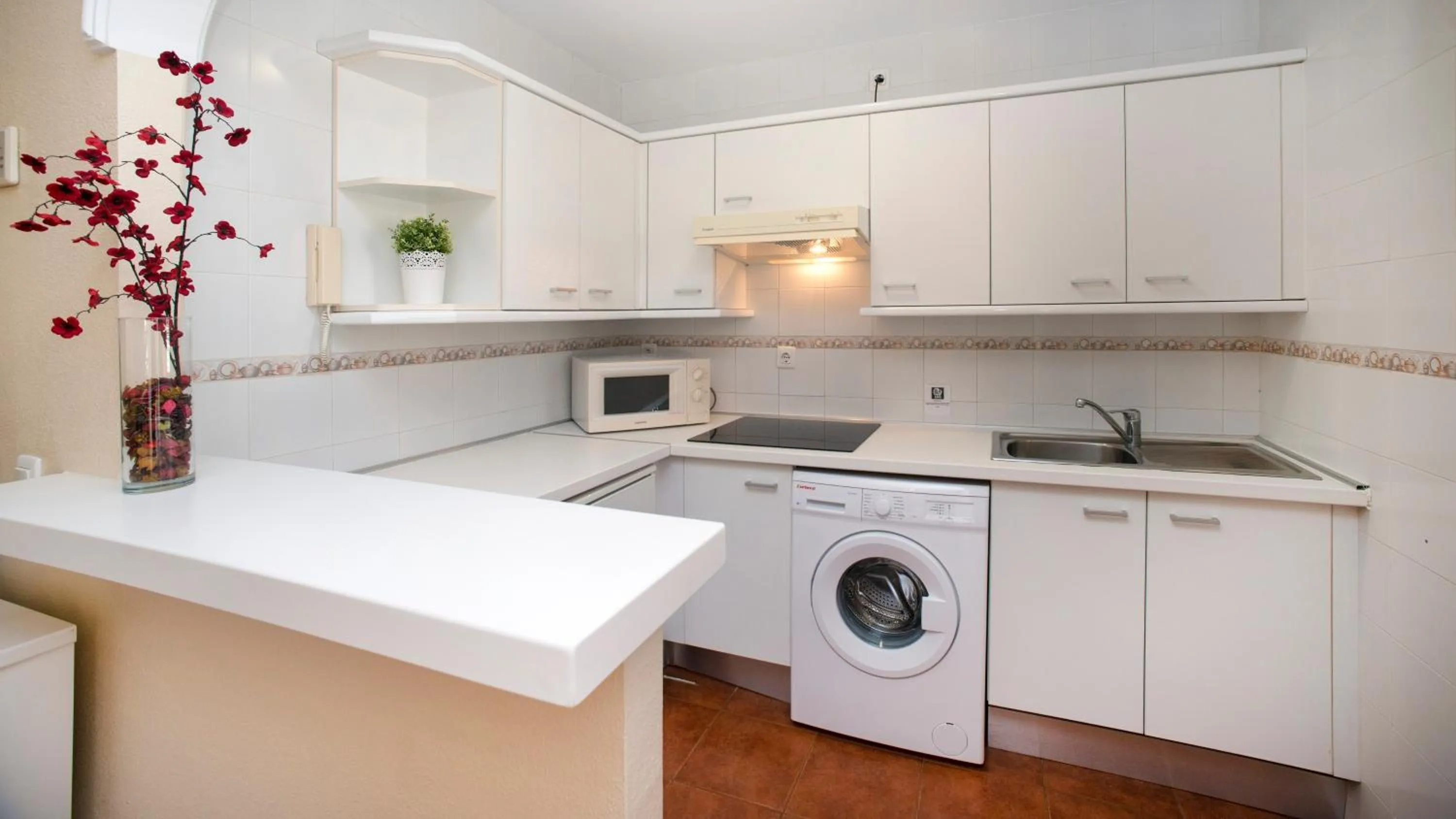 Kitchen or kitchenette in Leo Islamar