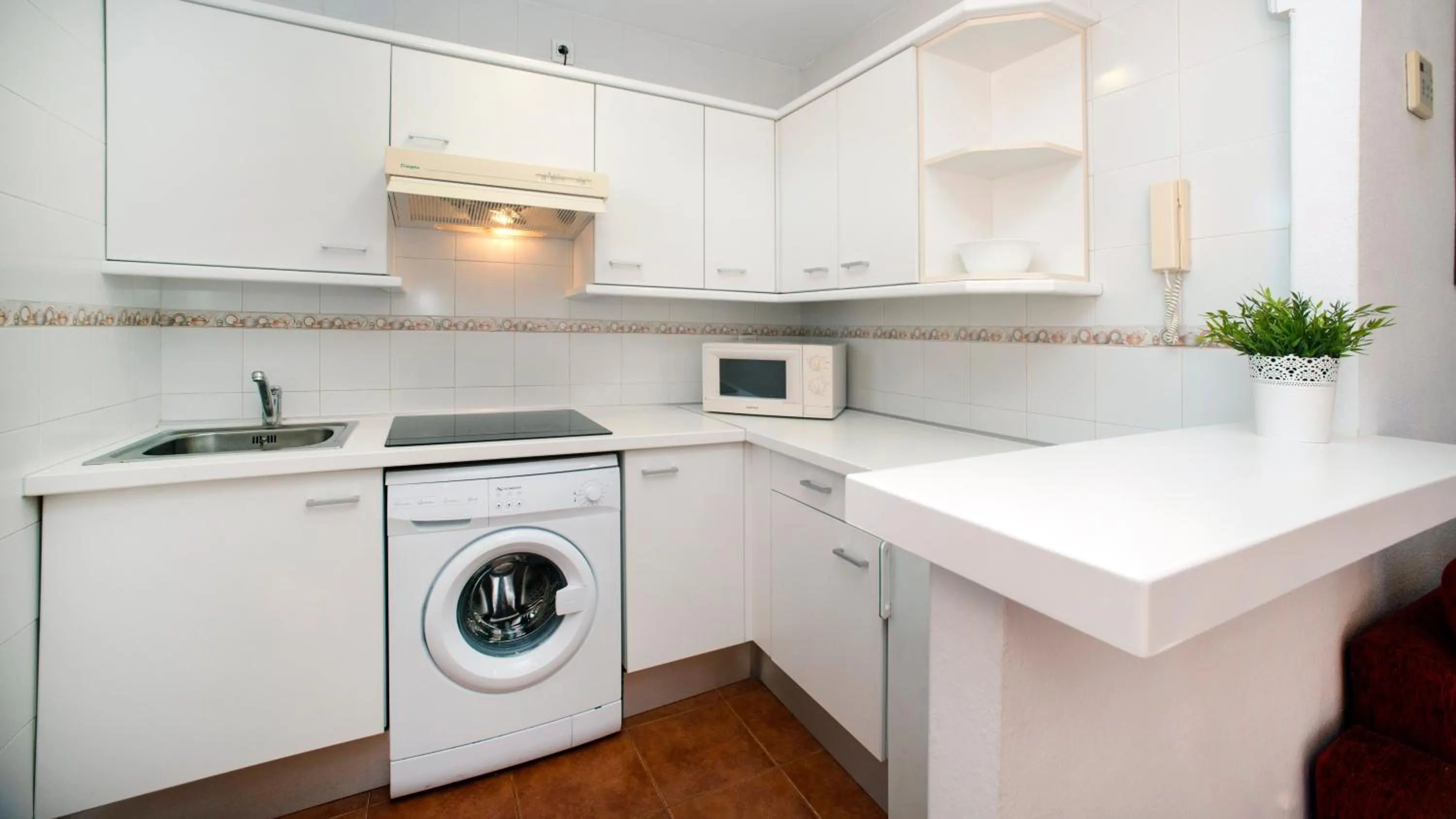 Kitchen or kitchenette in Leo Islamar