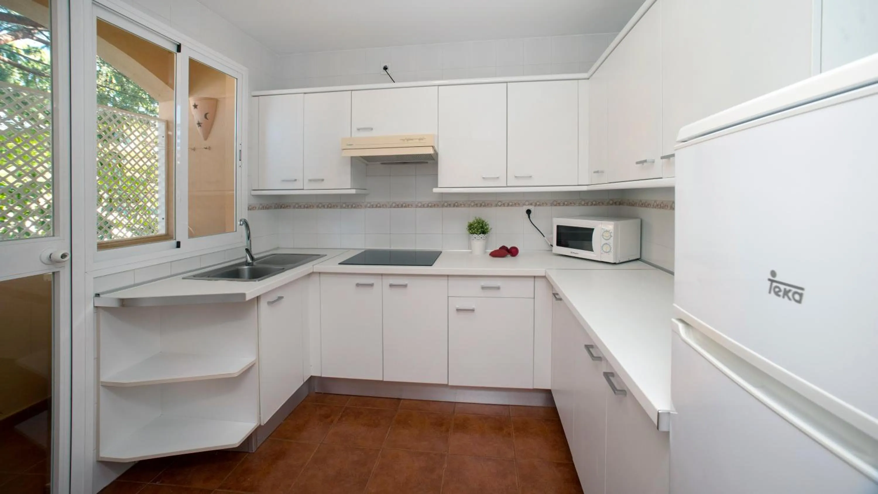 Kitchen or kitchenette in Leo Islamar