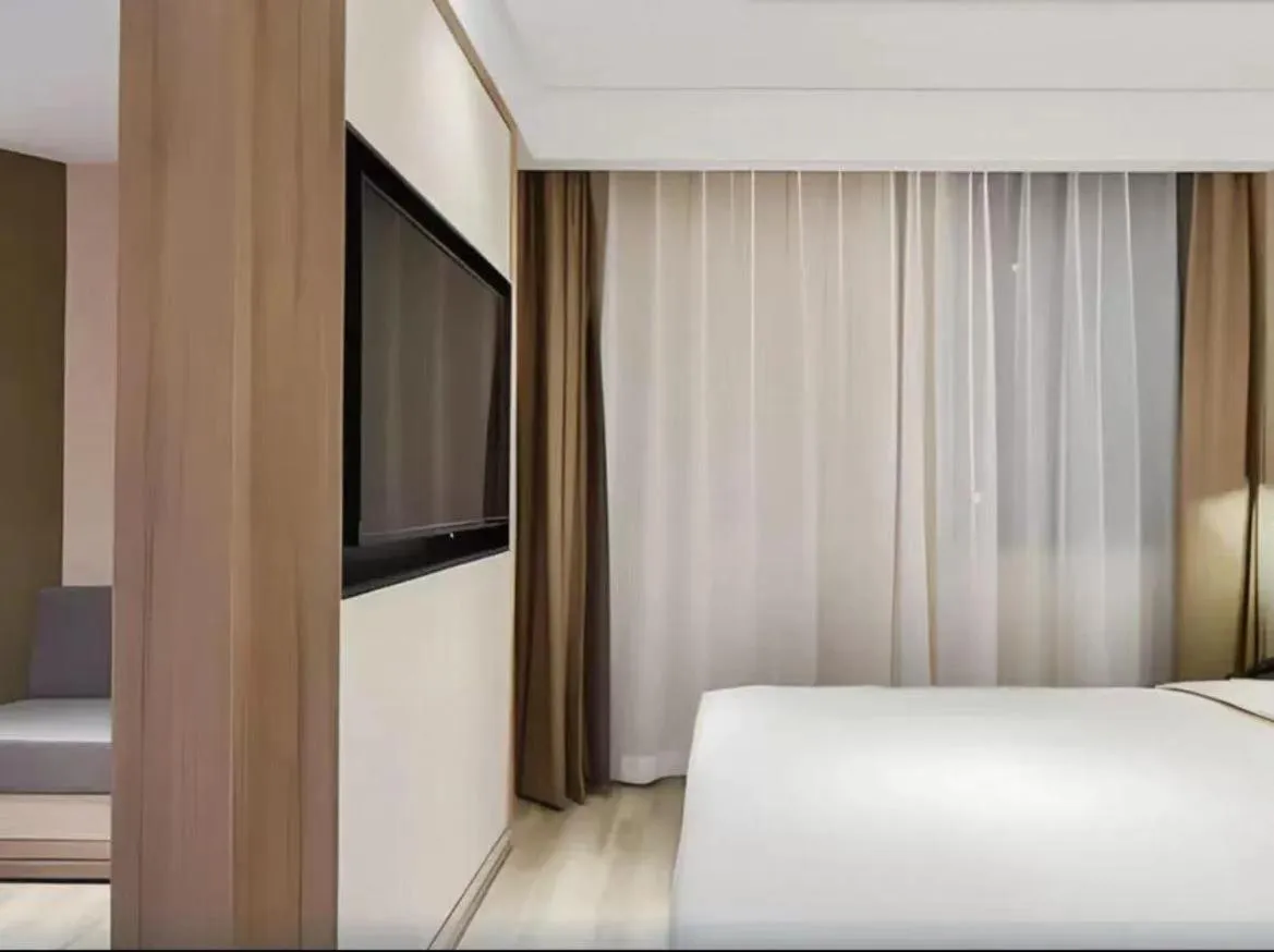 Bed in Atour Hotel Beijing Guomao Jingsong Railway Station