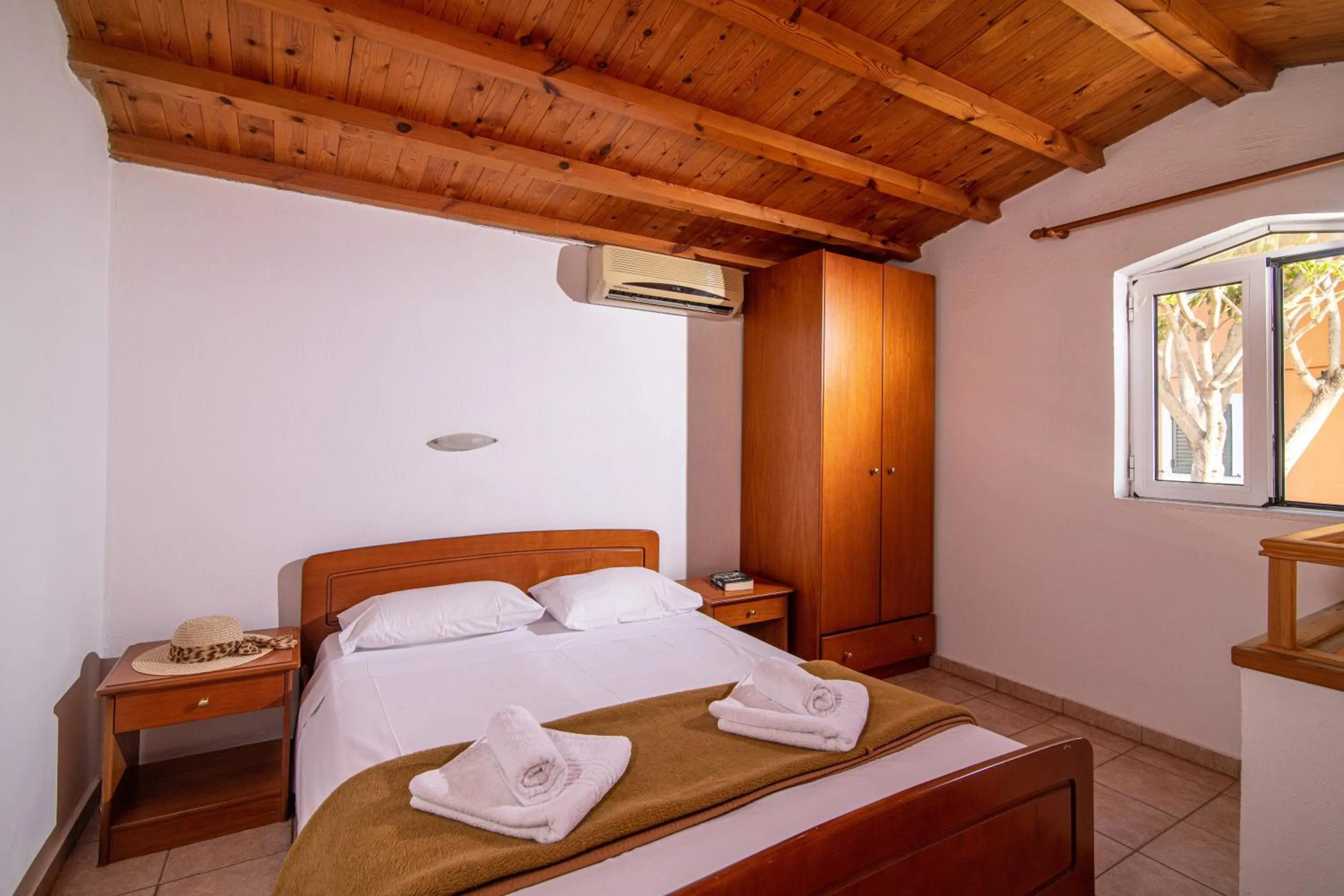 Bed in Golden Valentin Apartments