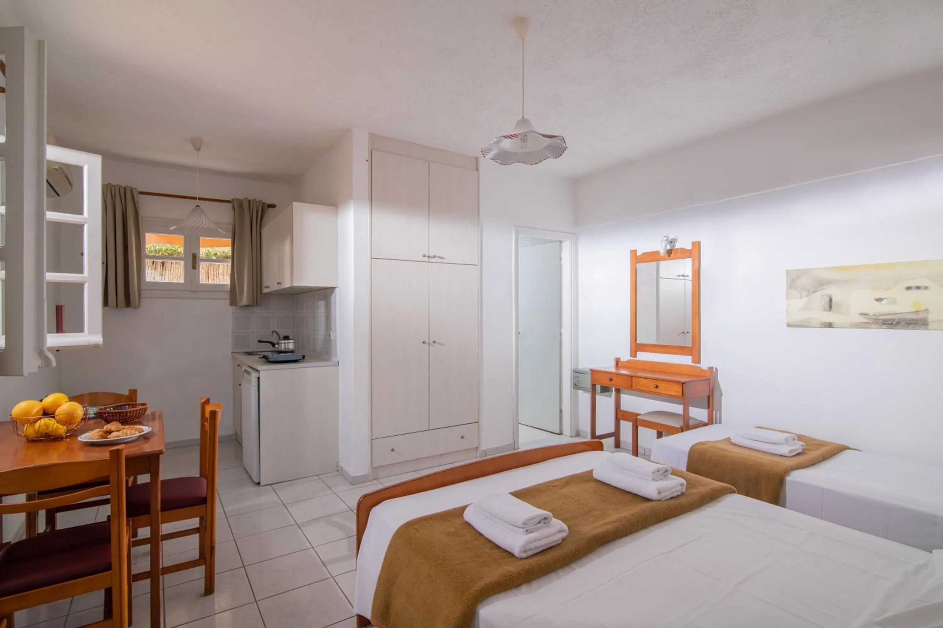 Bed in Golden Valentin Apartments