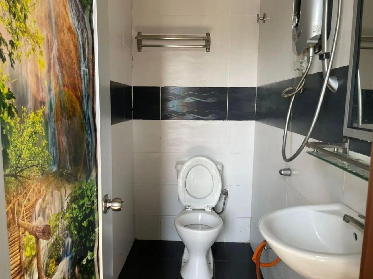 Bathroom in SV Andalas Hotel