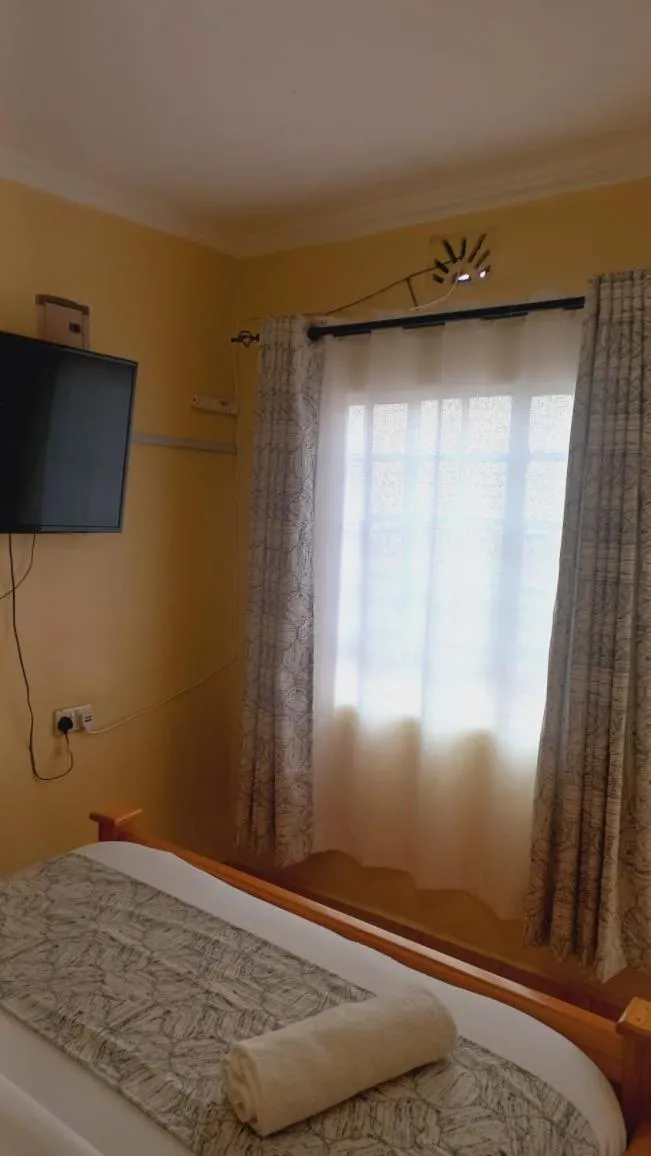 Bed in Landmark Guest house, Skuta area-Nyeri town