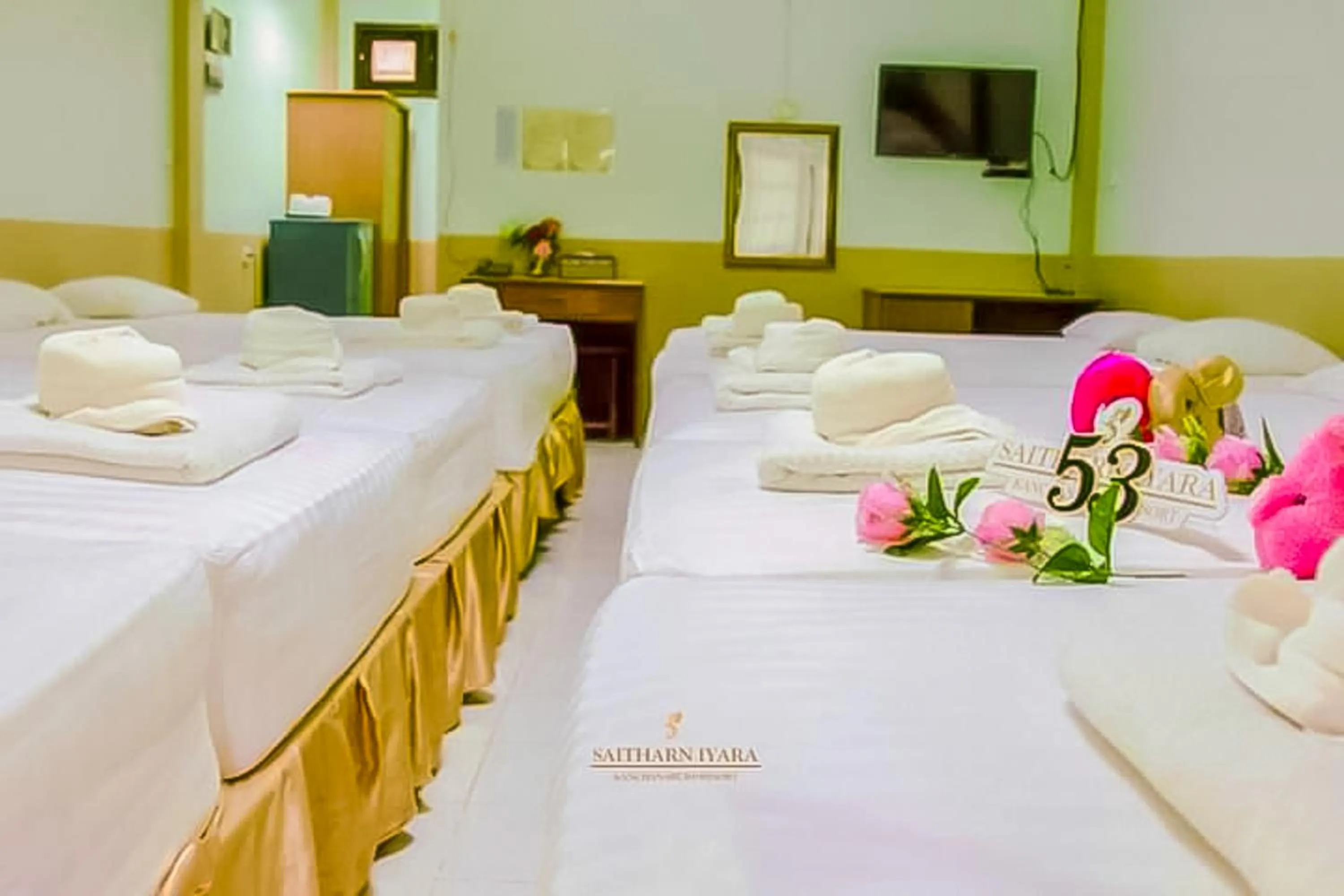 Bed in Saitharn Iyara Resort