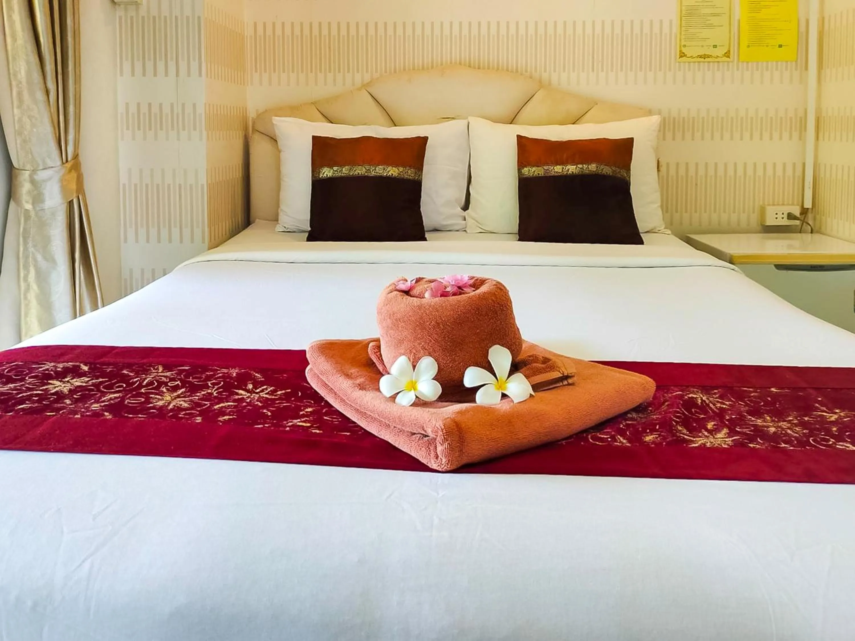 Bed in Saitharn Iyara Resort