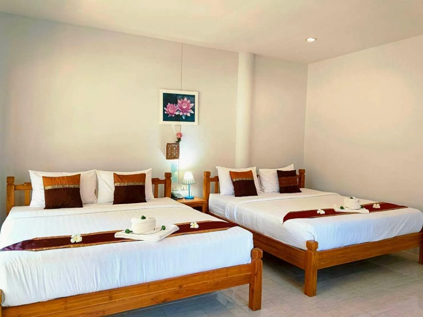 Bed in Saitharn Iyara Resort