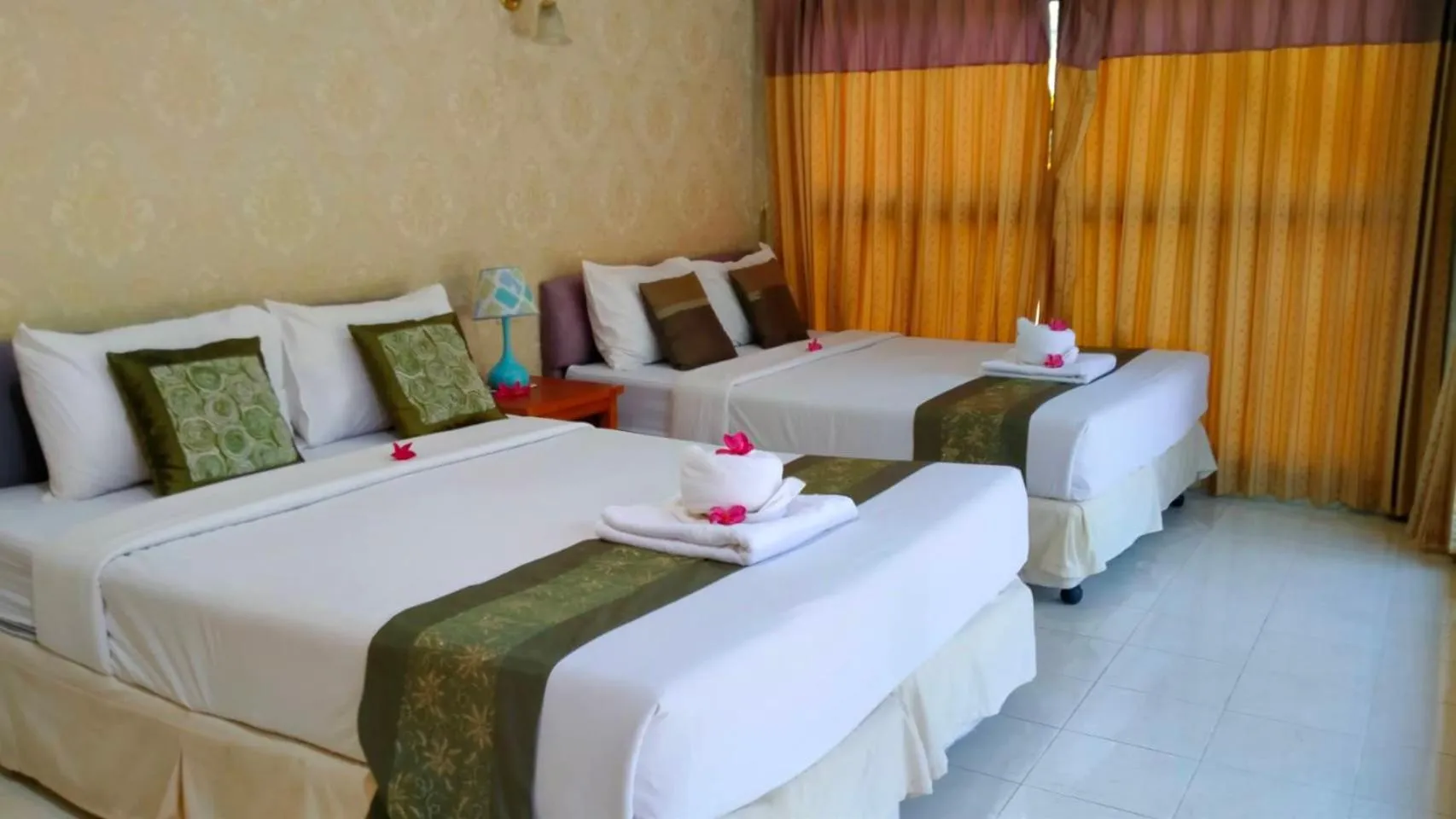 Bed in Saitharn Iyara Resort