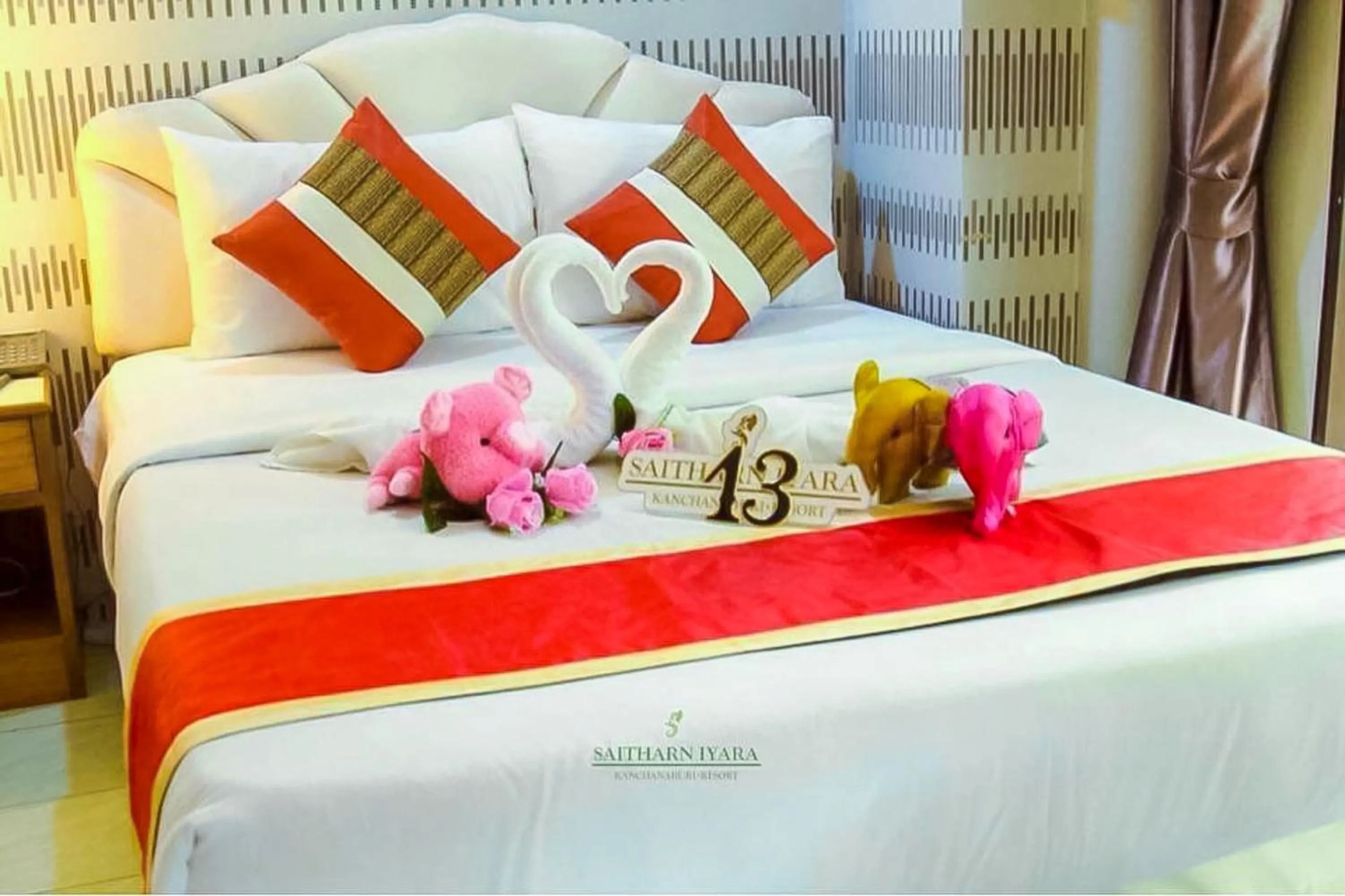 Bed in Saitharn Iyara Resort