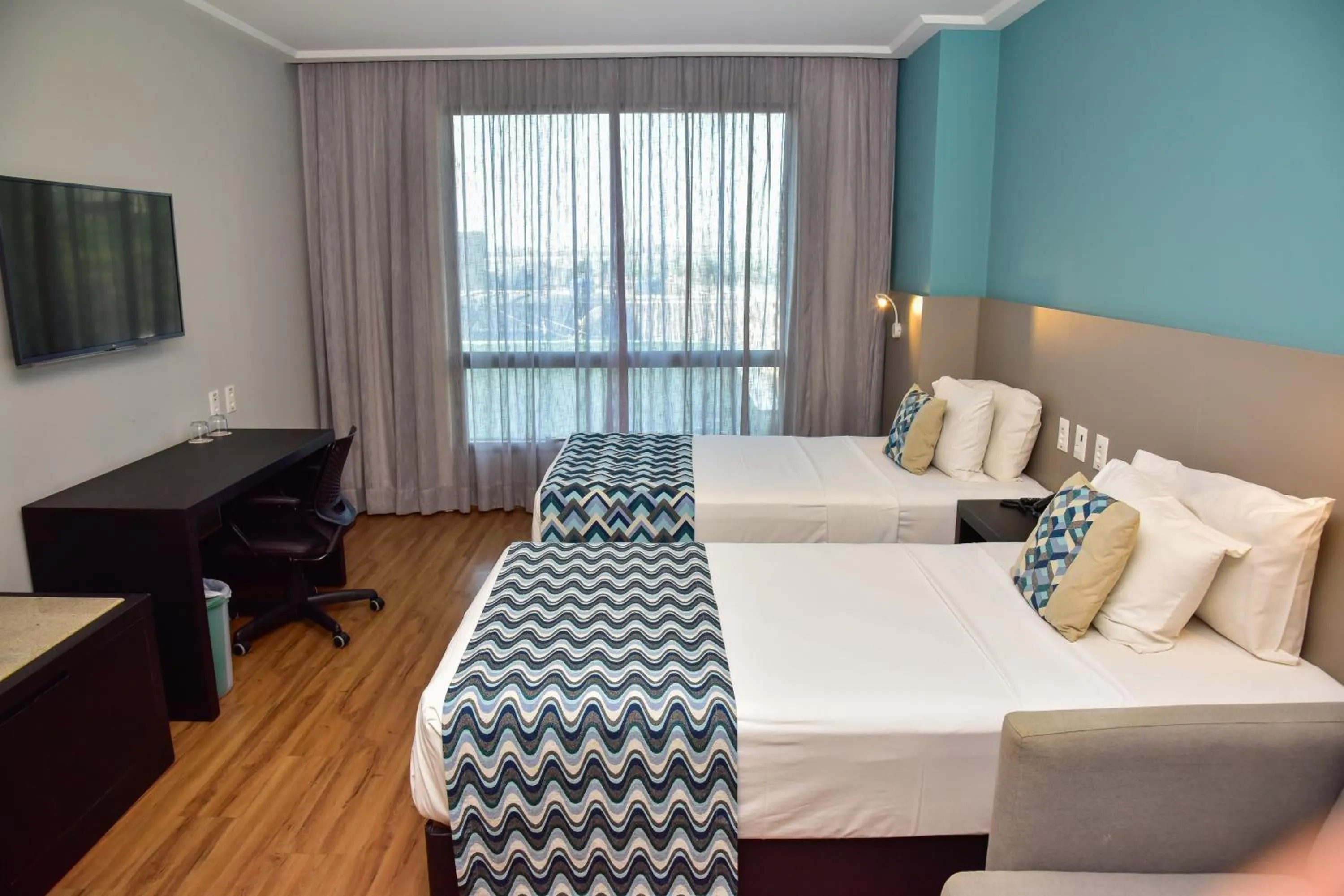 Bedroom, Bed in Comfort Suítes Vitória