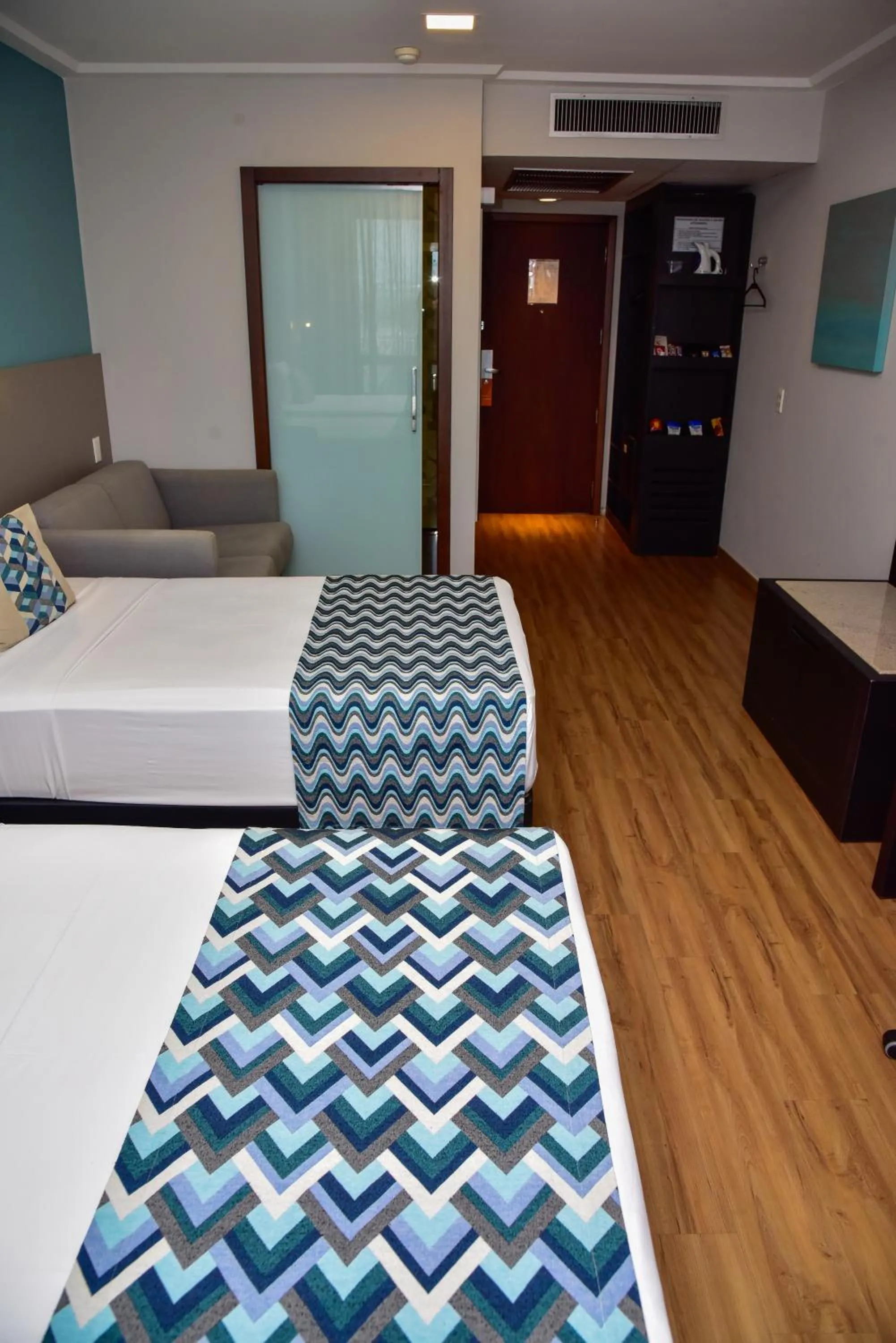 Bedroom, Bed in Comfort Suítes Vitória