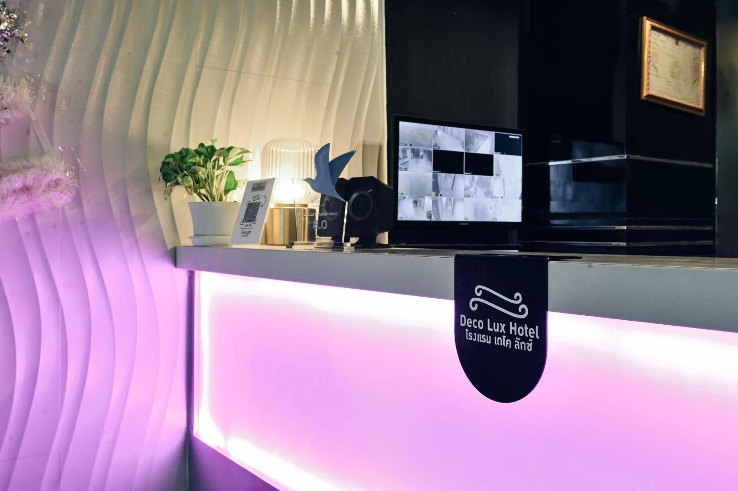 Property logo or sign in Deco Lux Hotel