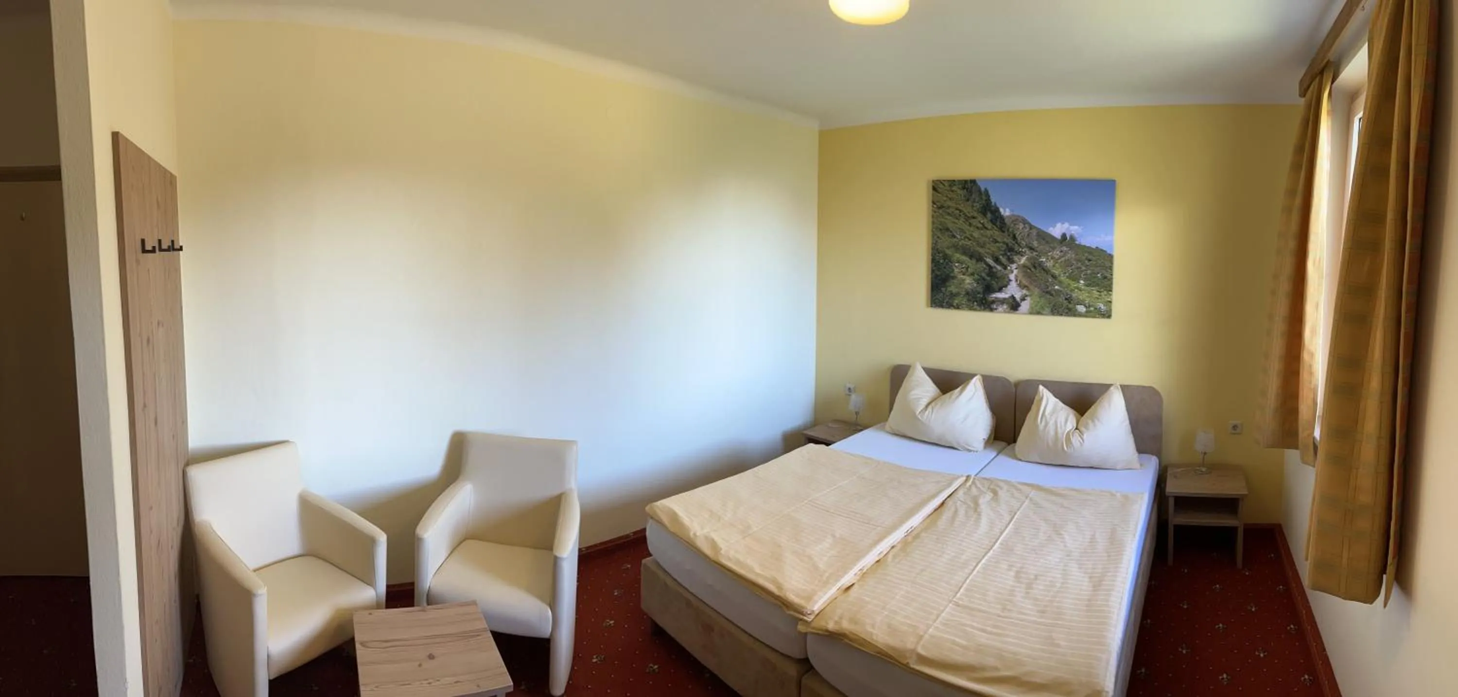 Photo of the whole room, Bed in Landhotel Gasthof Eichhof Natters