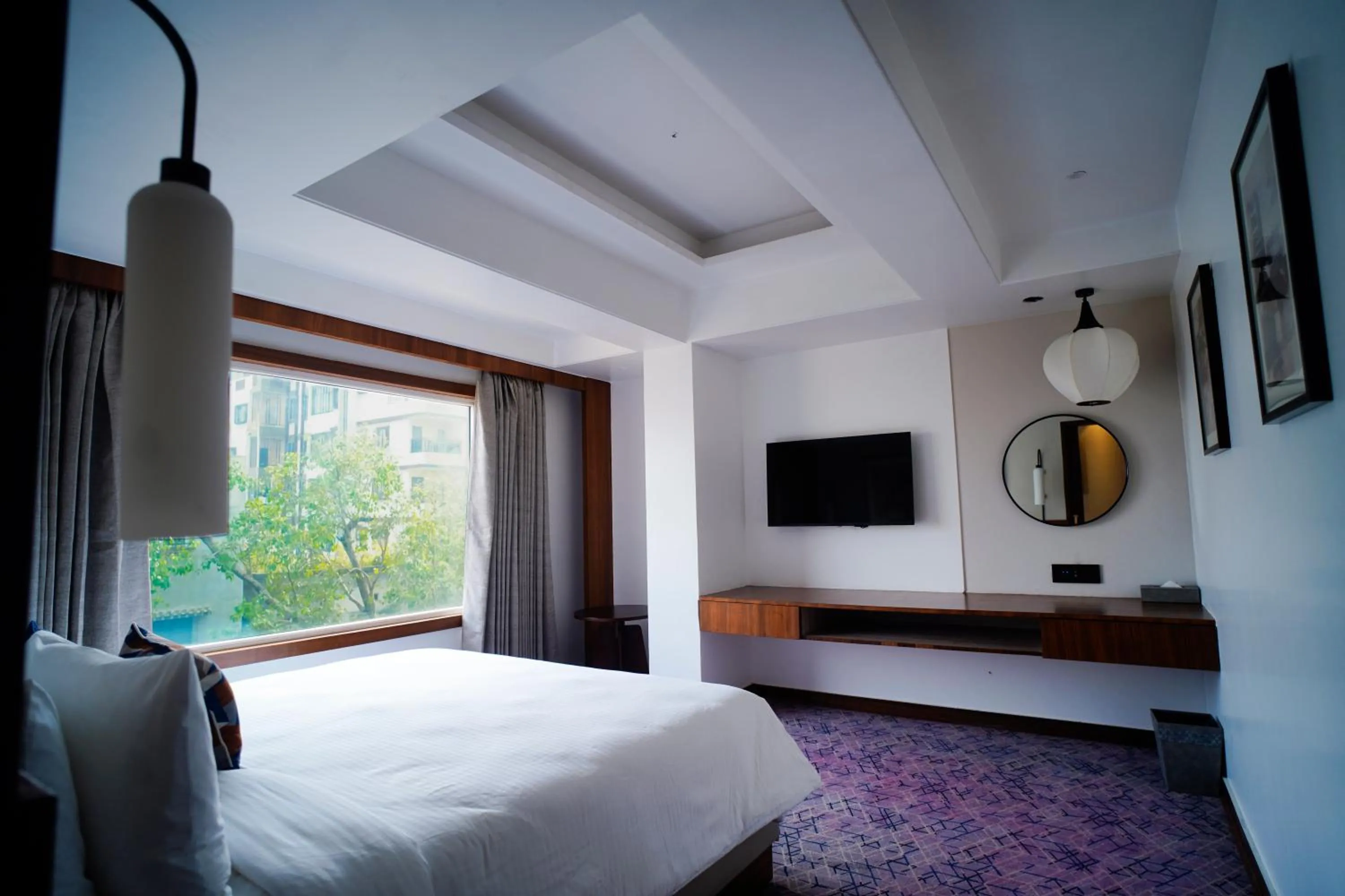 Bed in Ishaan Sarovar Portico Deoghar
