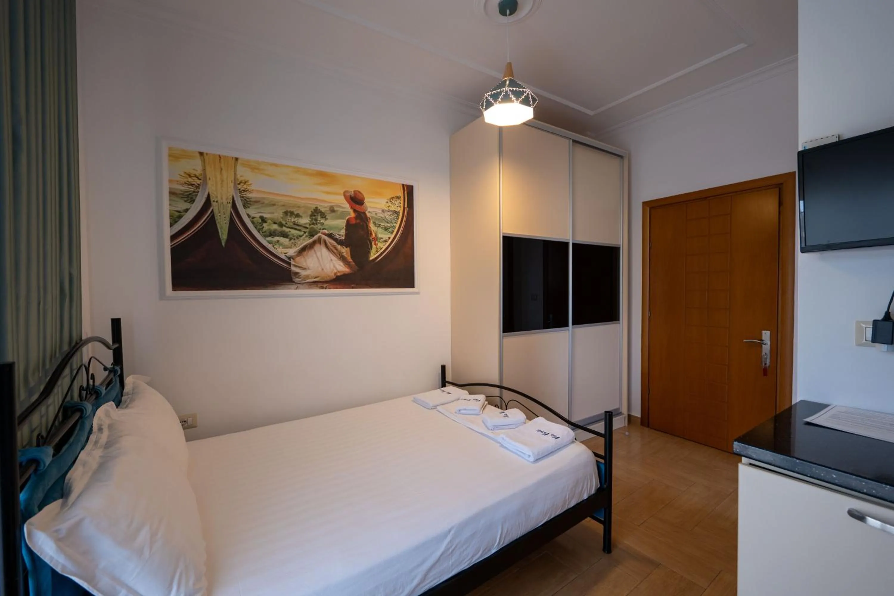 Communal lounge/ TV room, Bed in Vila Vasili