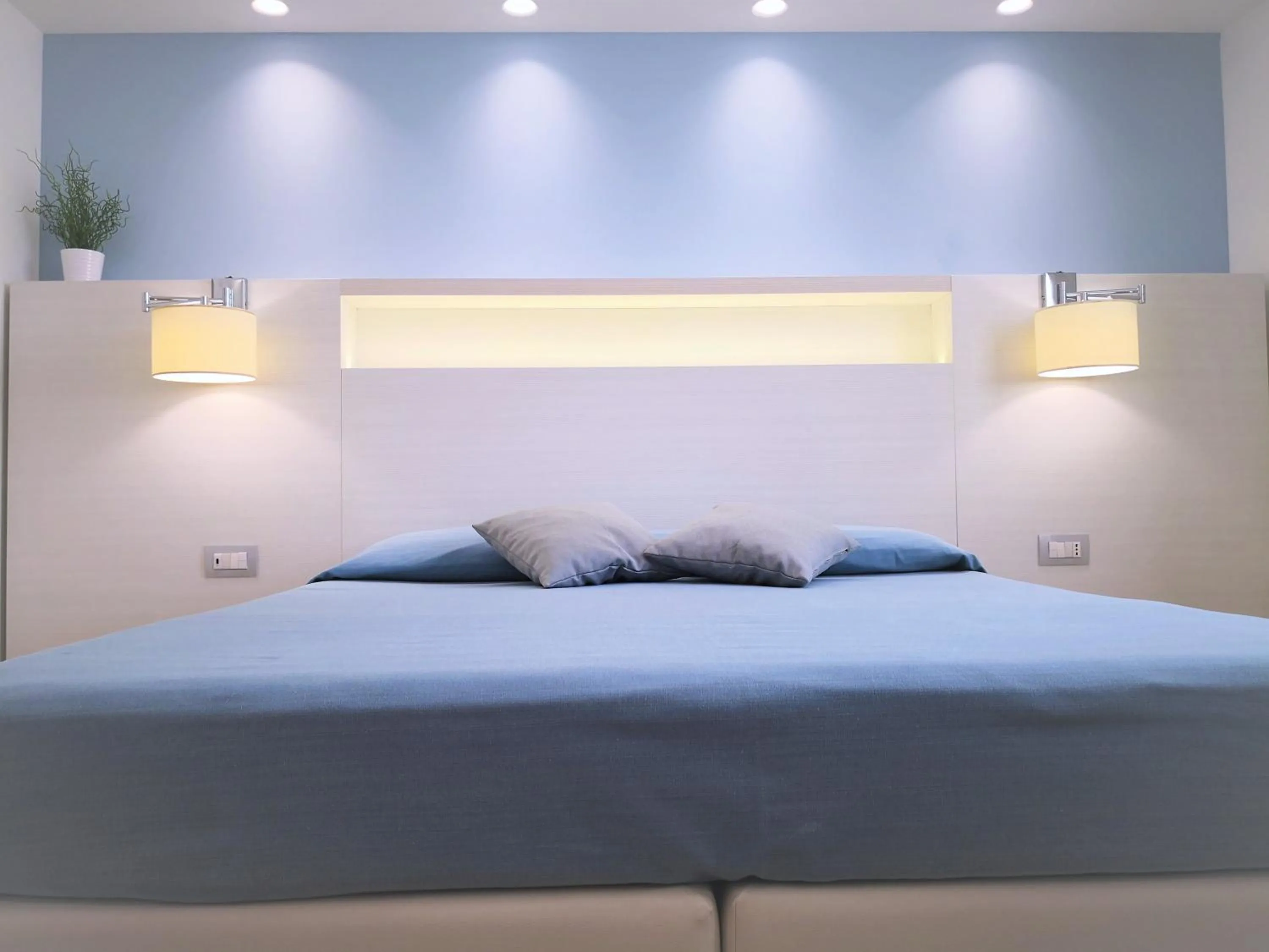 Bed in Hotel Perla Gaia