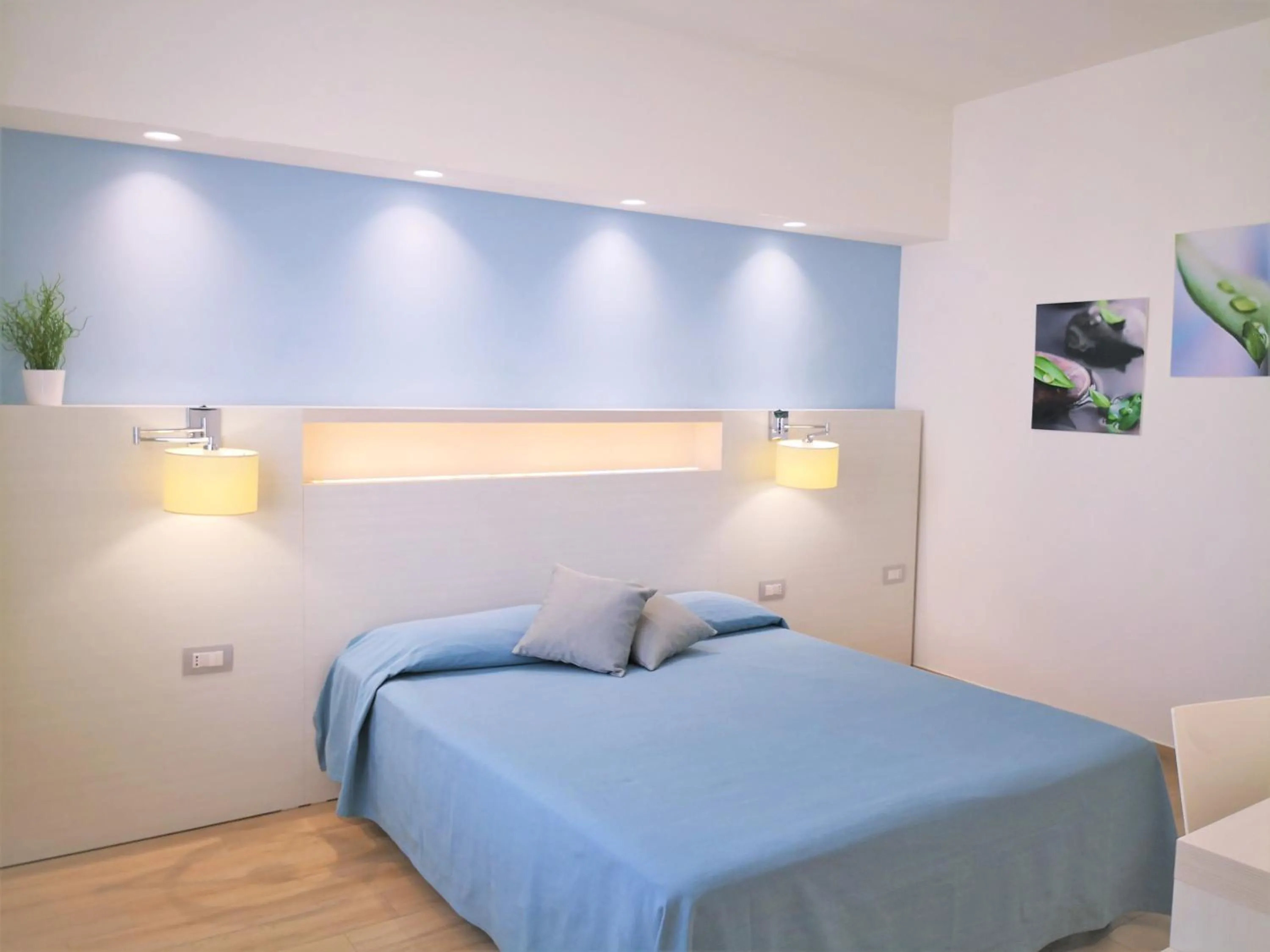 Bed in Hotel Perla Gaia