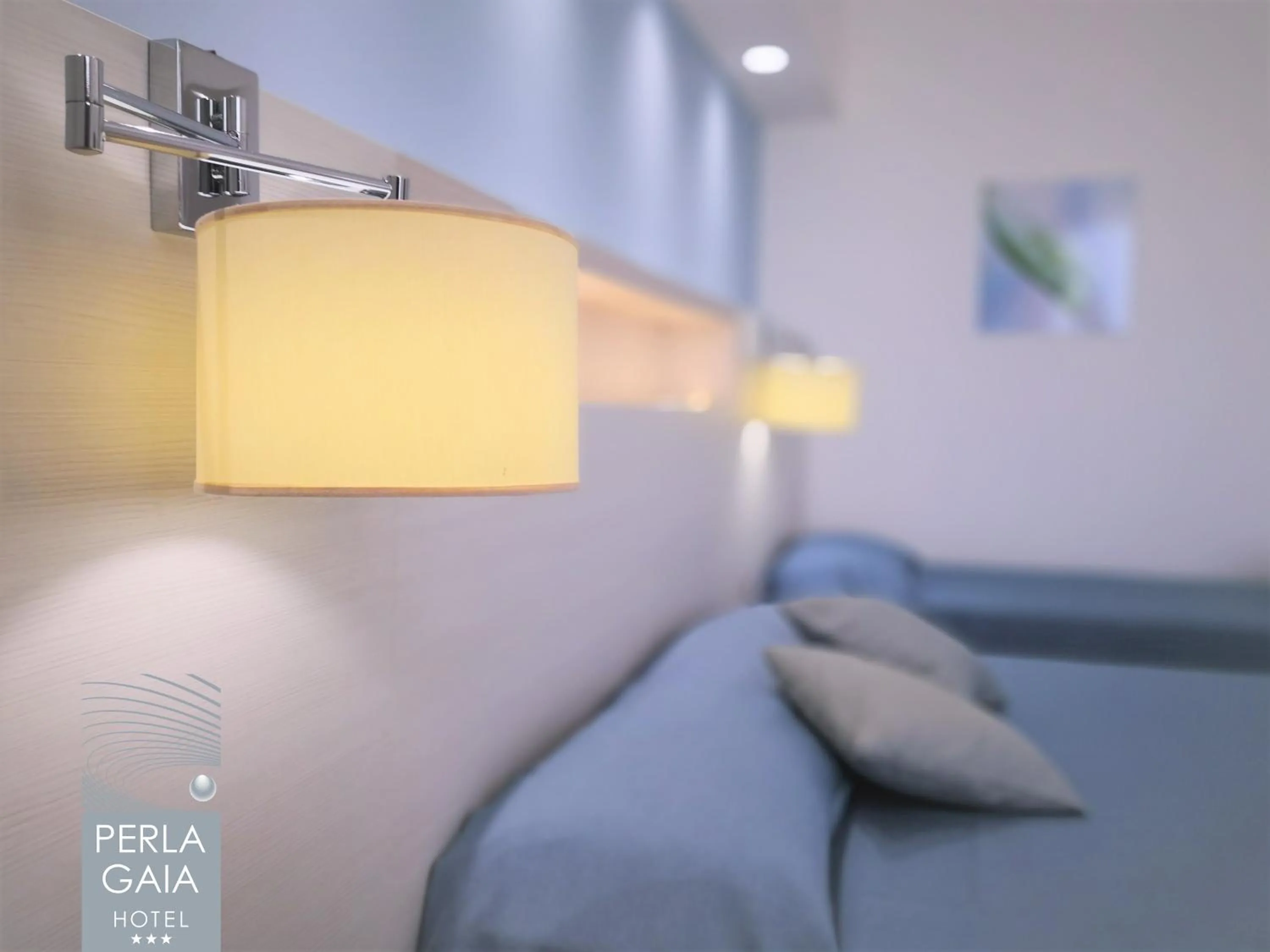 Bed in Hotel Perla Gaia