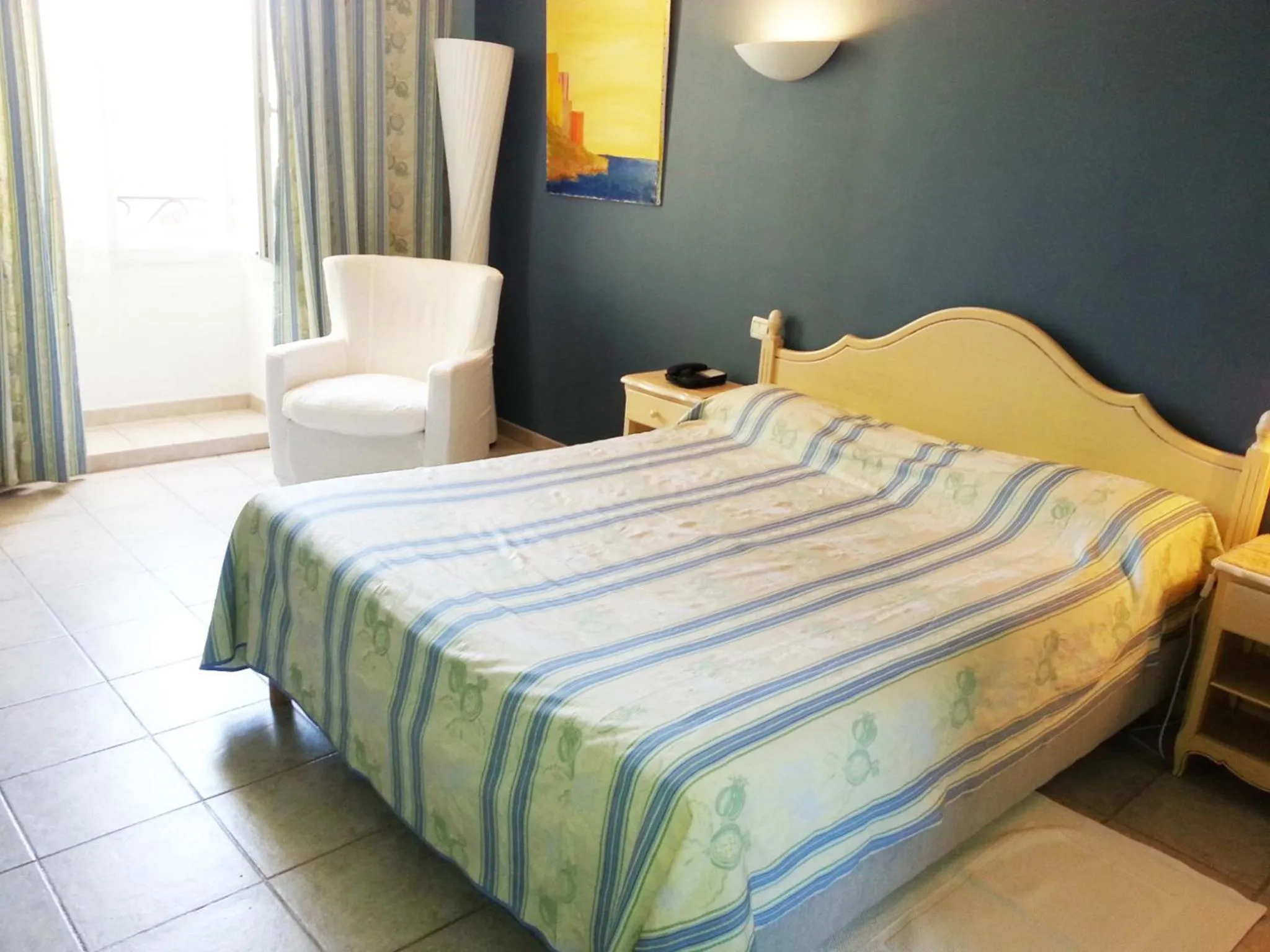 Bedroom, Bed in Hôtel Les Palmiers