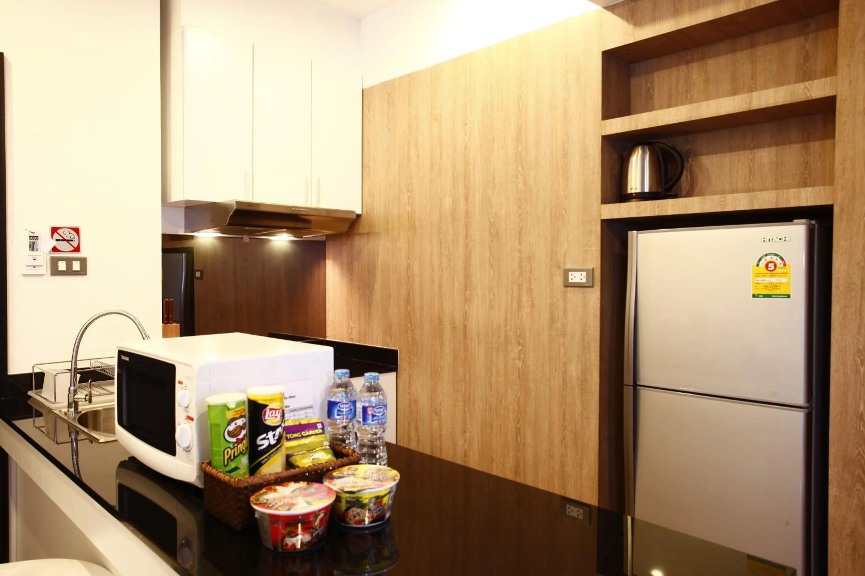 Kitchen or kitchenette in Buasri By Ohm