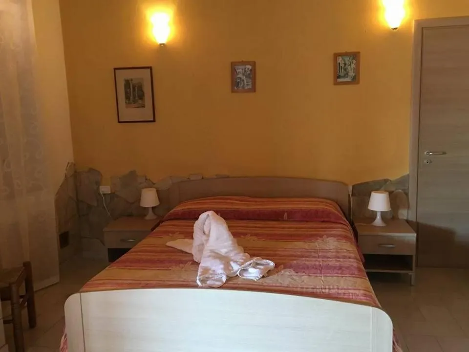 Bed in Hotel Villaggio Stromboli