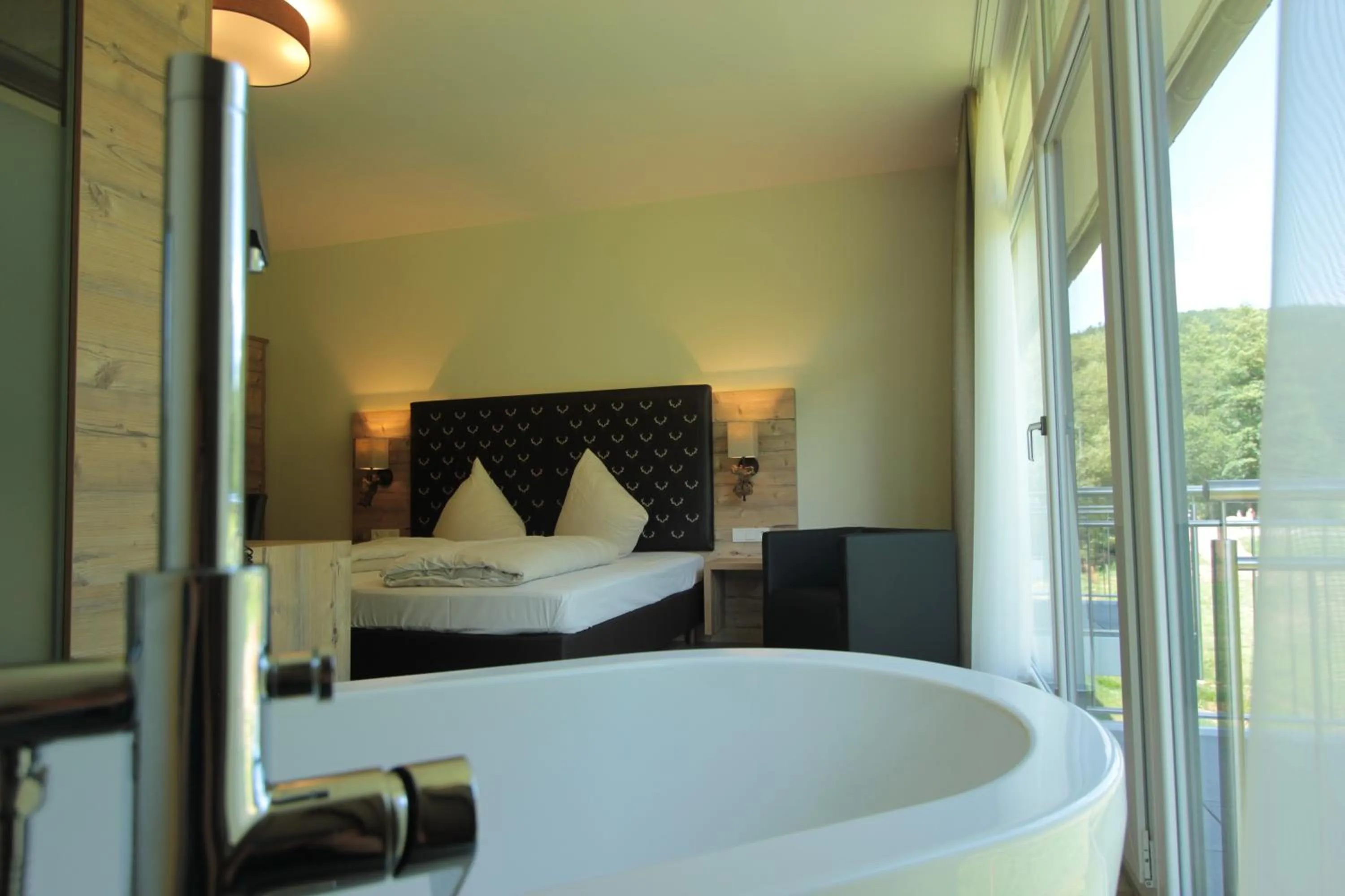 Photo of the whole room, Bed in Landhotel Weihermühle