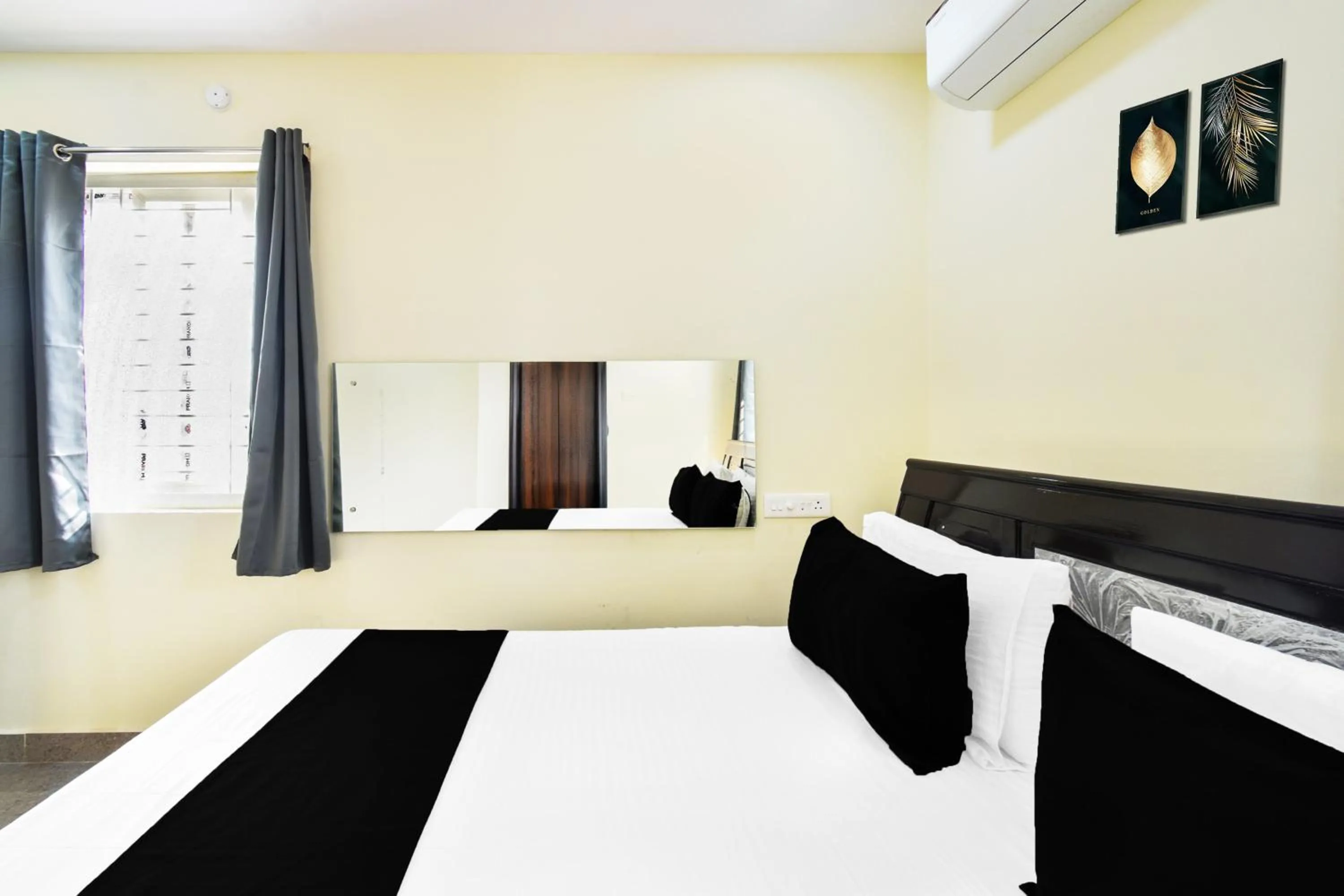 Bedroom in Hotel O Tripura Grand (Near Nexus Mall)