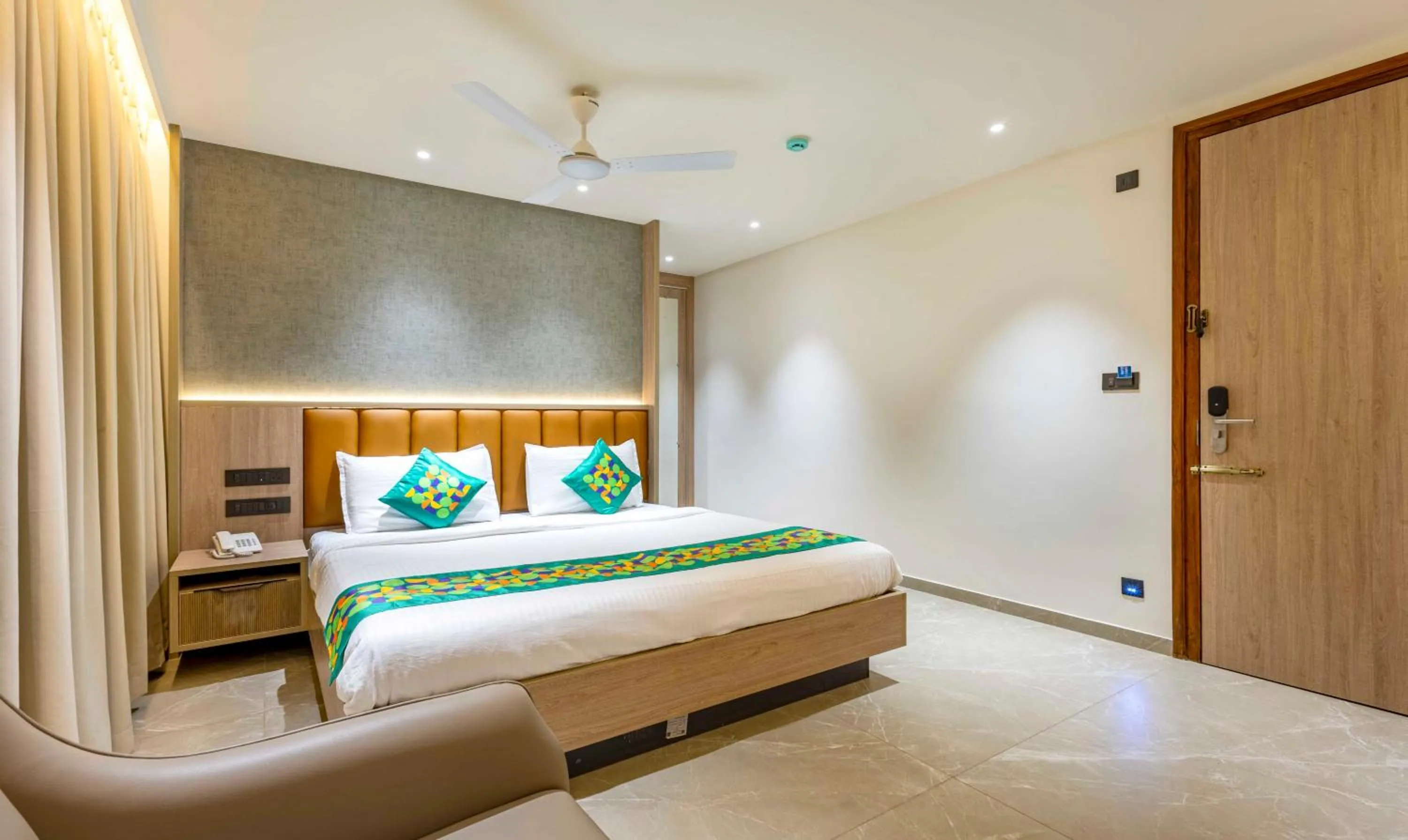 Bedroom, Bed in Treebo Premium Lalitha, RK Beach