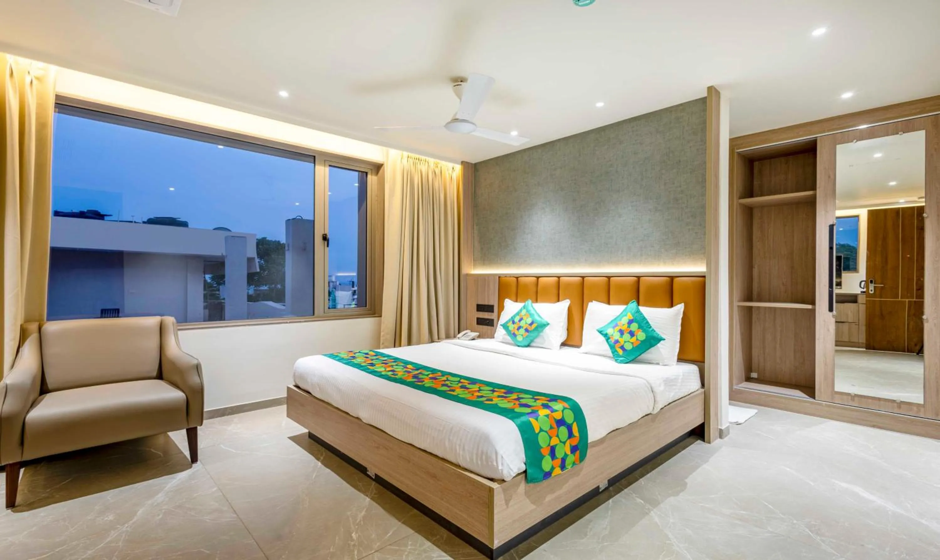 Bedroom, Bed in Treebo Premium Lalitha, RK Beach